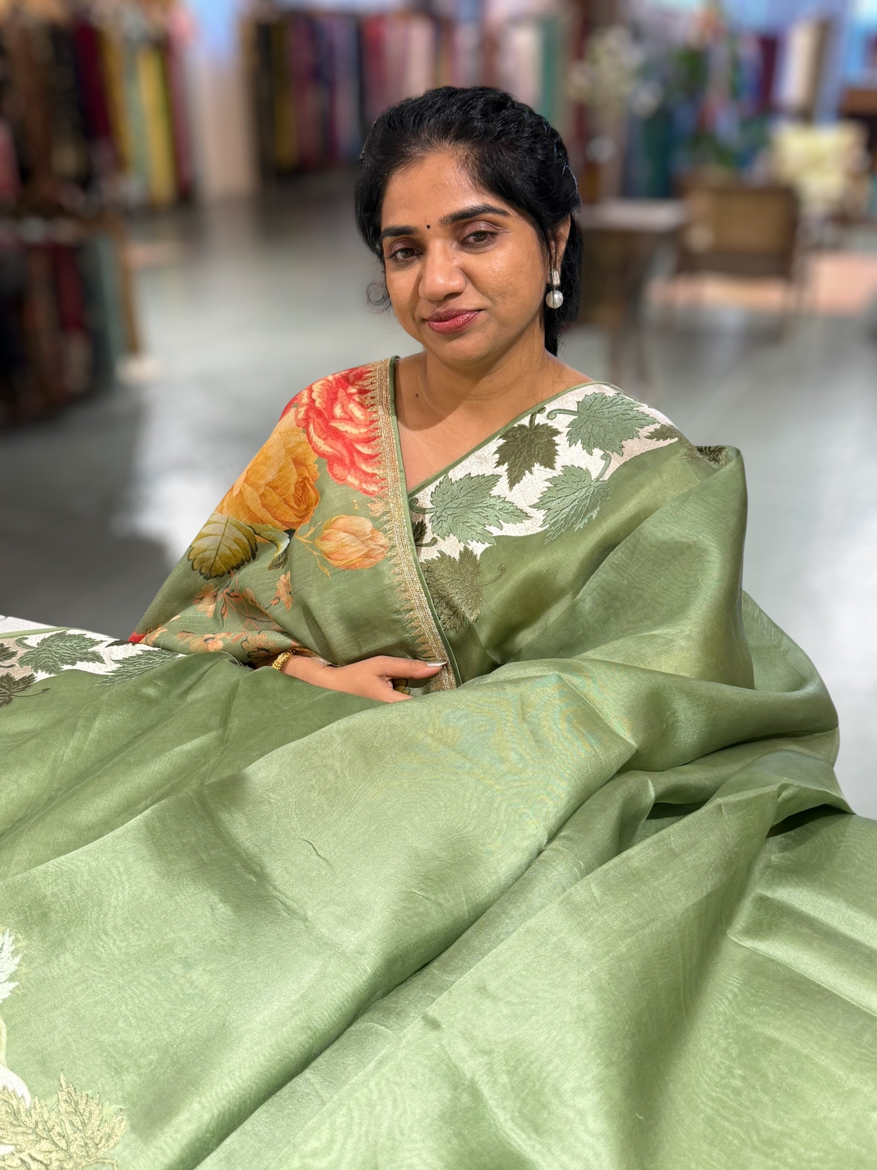 Sage Green Organza Saree with Stunning Leaf Embroidered Border