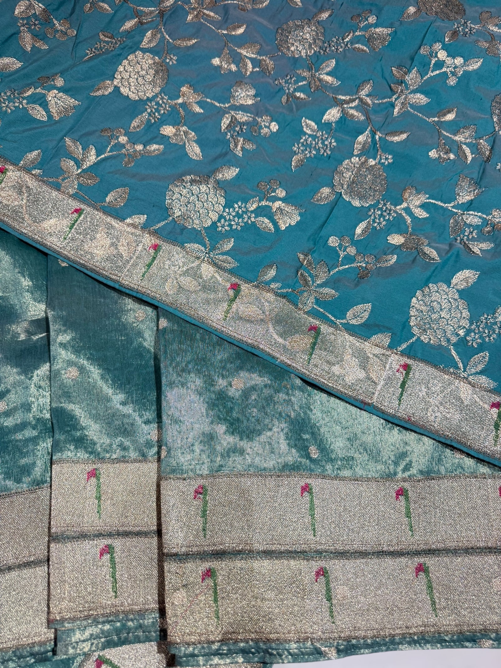 Teal Tissue Saree with pythani inspired muniya borders