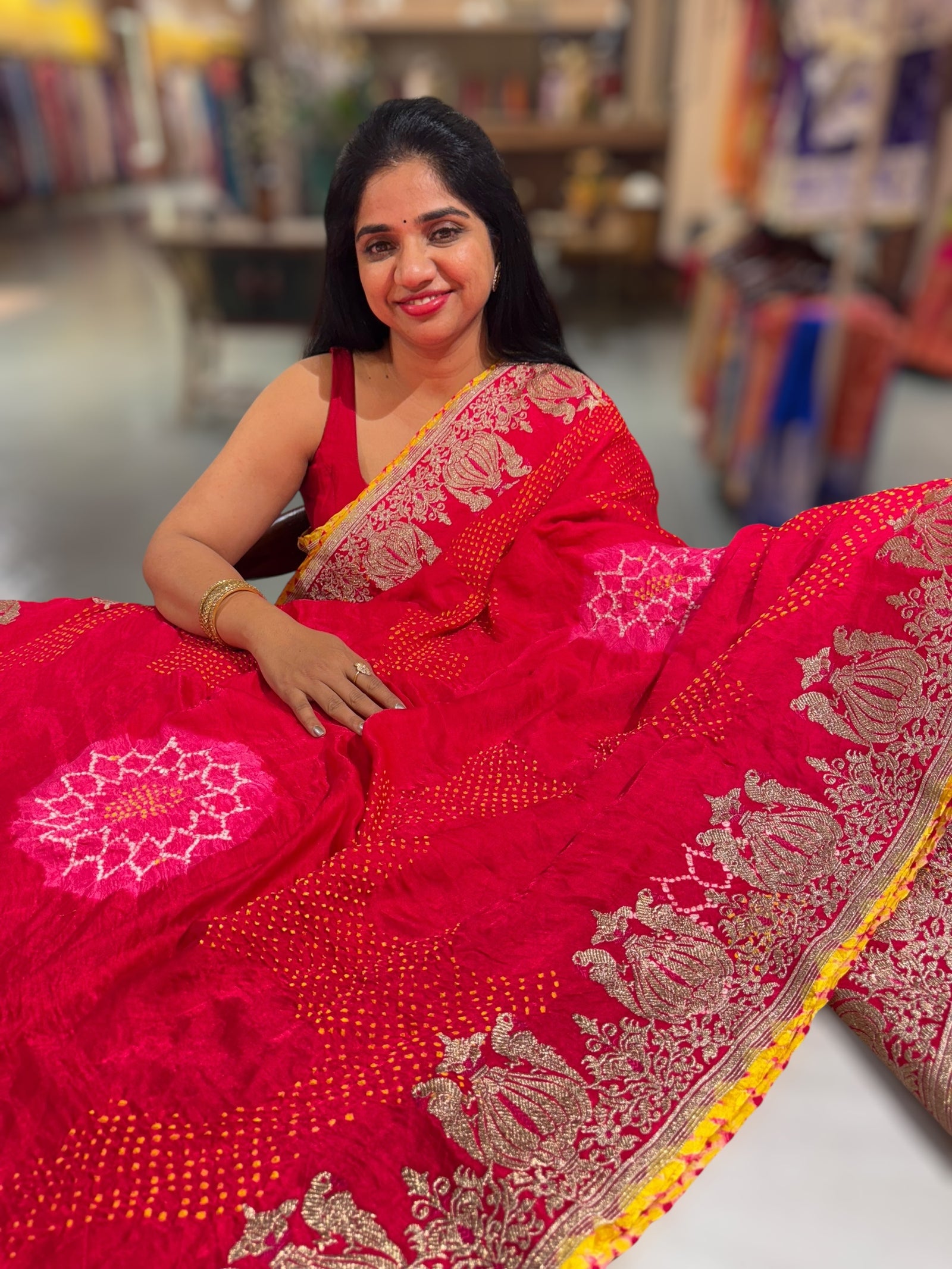 Reddish Pink Designer Rai Bandhej Saree With Embroidered Border