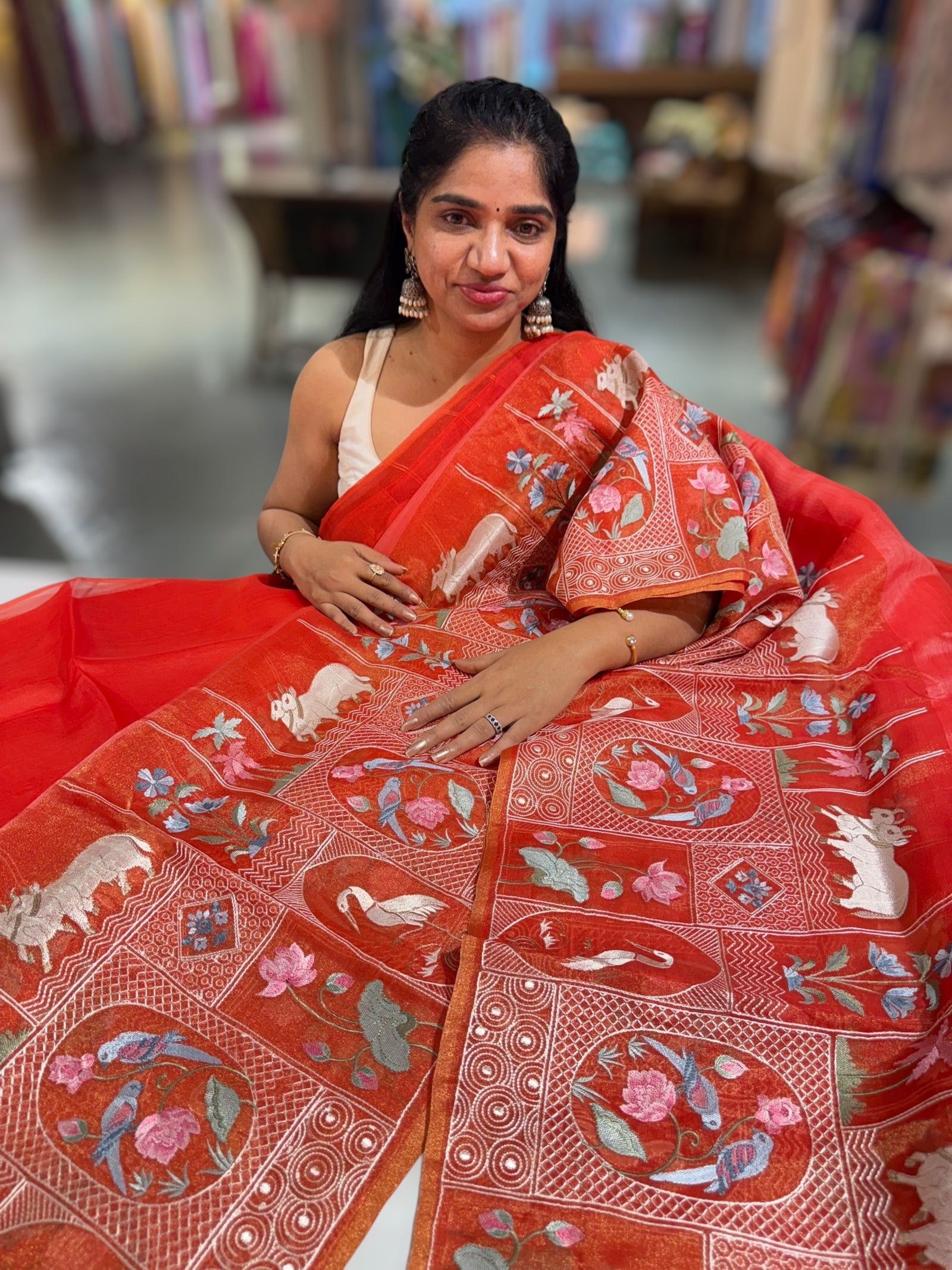 Reddish Orange Kora-Tussar blend Handloom Saree with Tissue embroidered Skirt Border