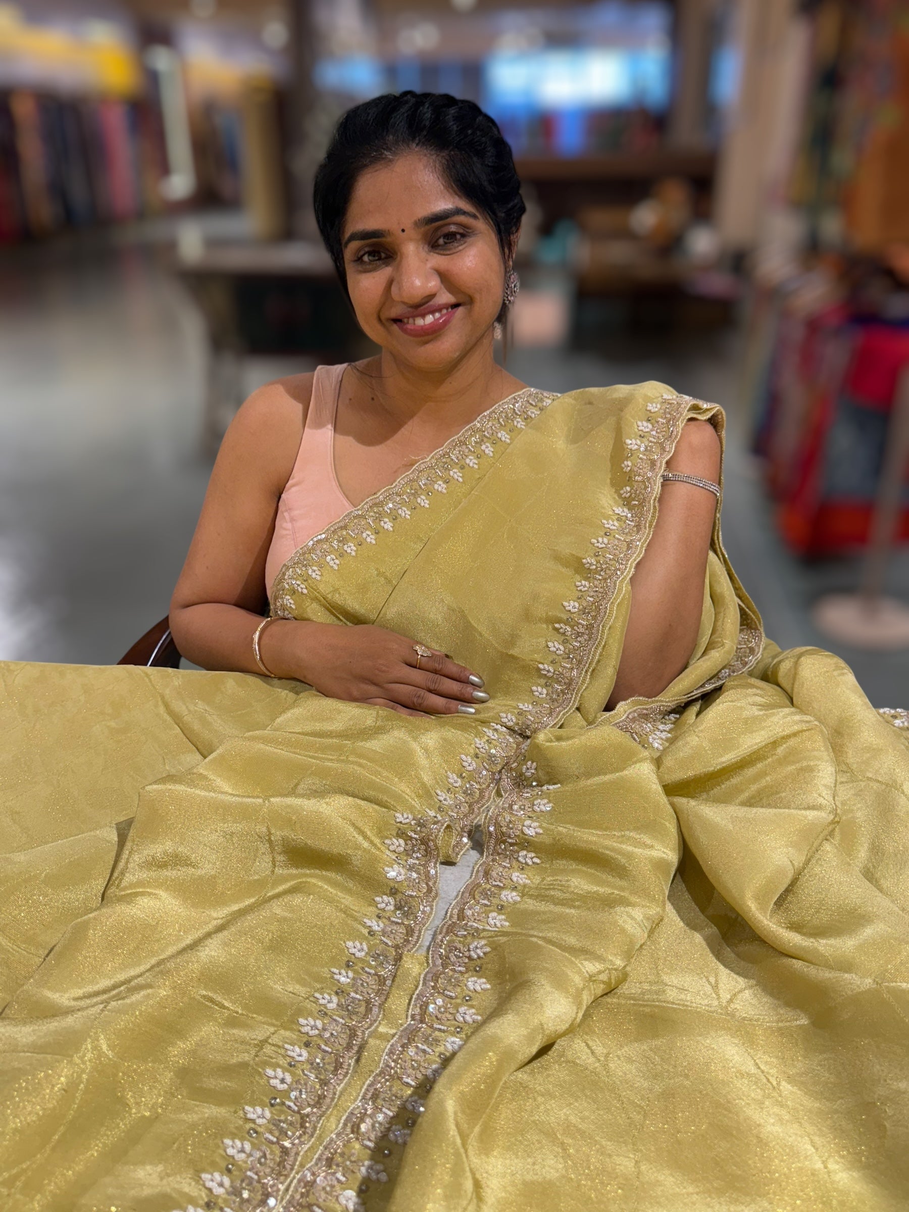 Pastel Yellow Tissue Gorgette Saree With Hanwork Border and Blouse.