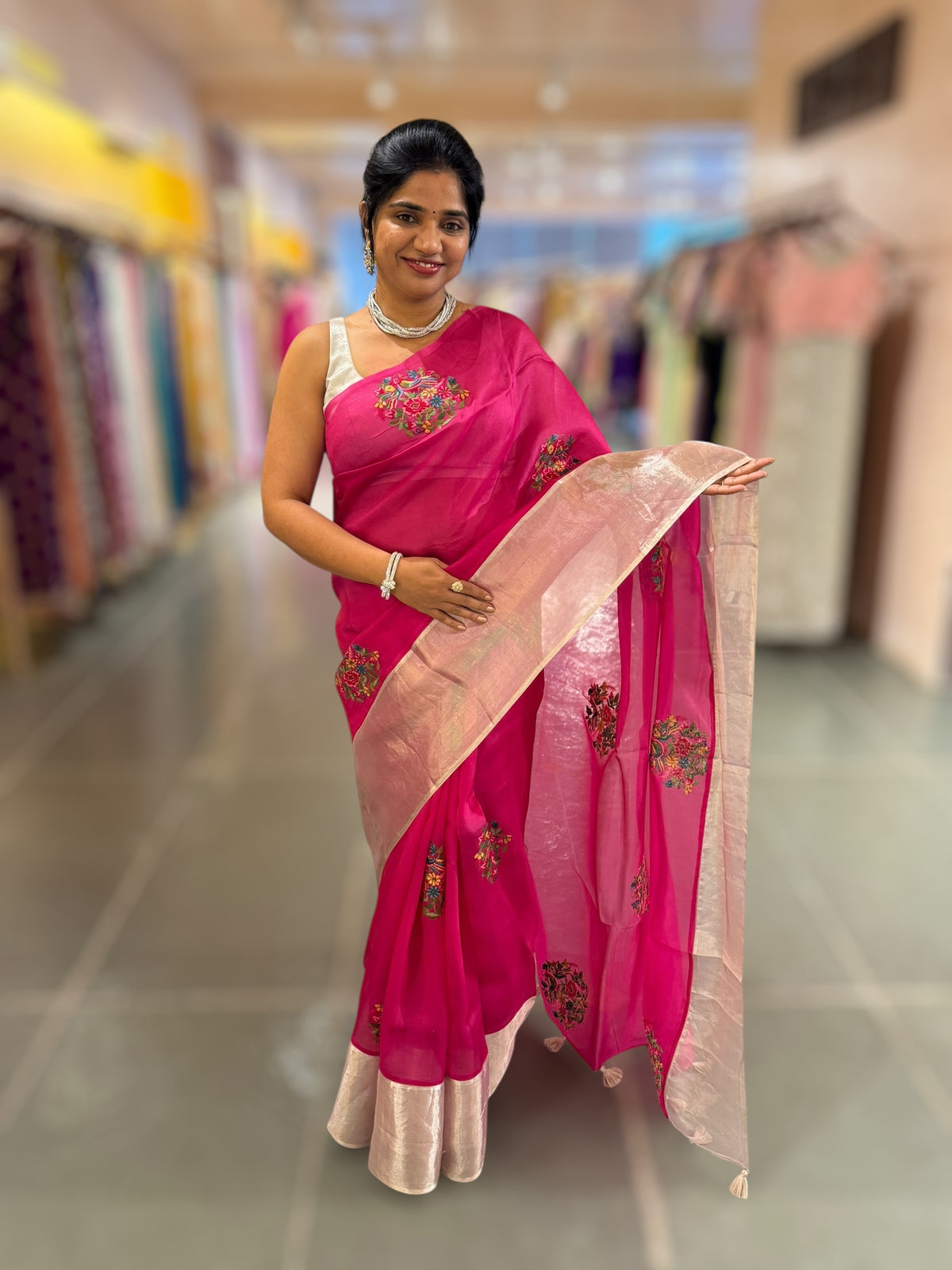 Rani Pink Organza Saree with pure Tissue Border