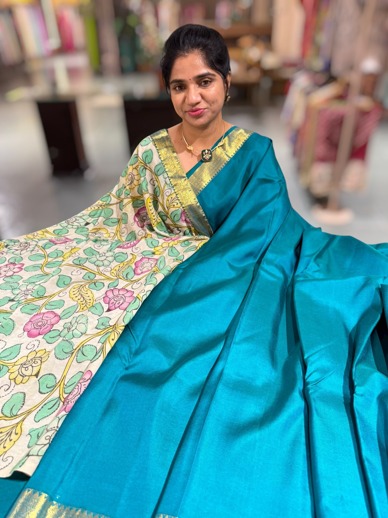 Peacock Green vintage Kanchipuram silk saree with pen kalamkari blouse