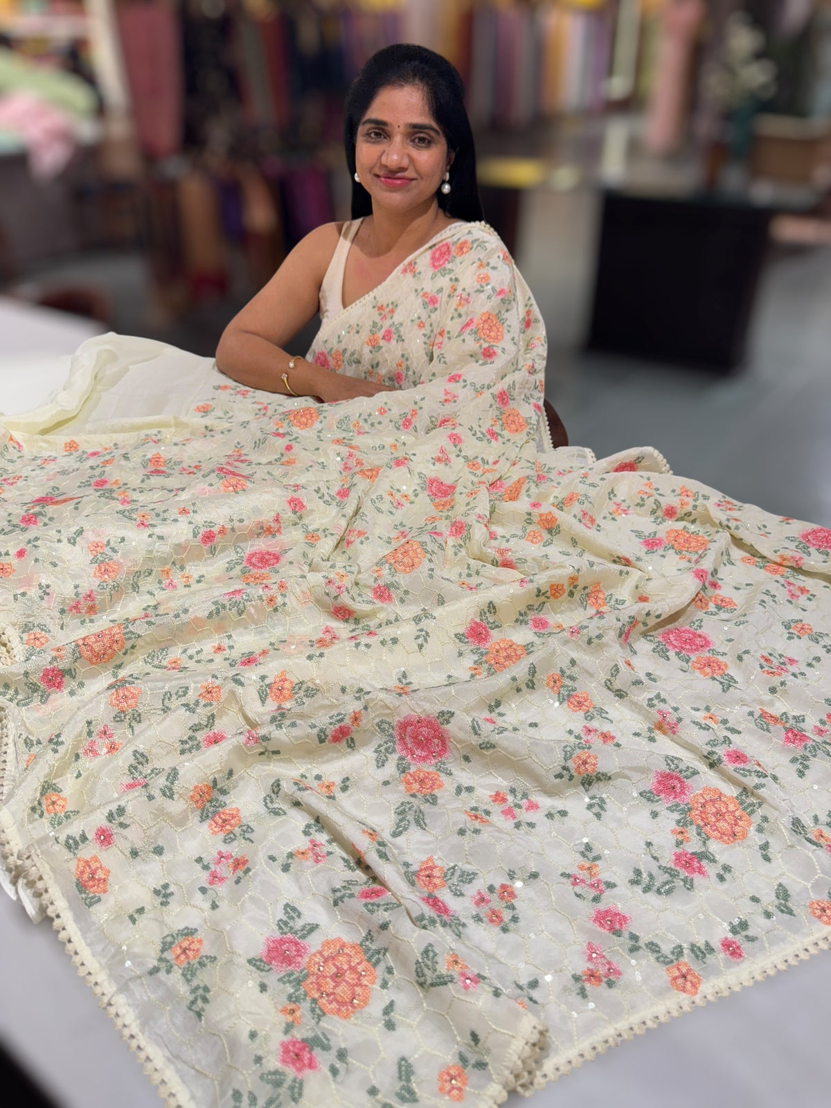 Ivory Chinnon saree with allover petite point embroidery