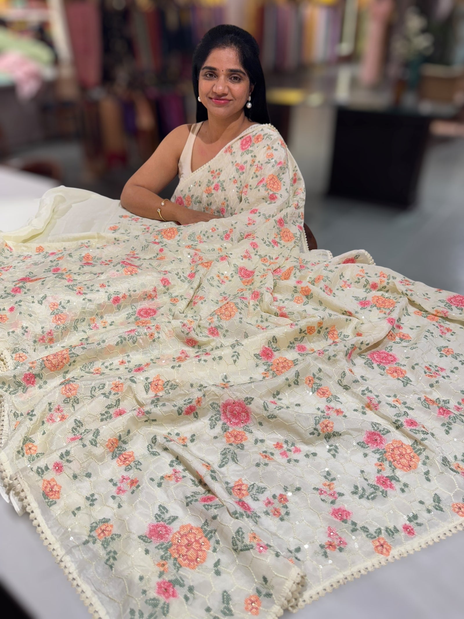 Ivory Chinnon saree with allover petite point embroidery