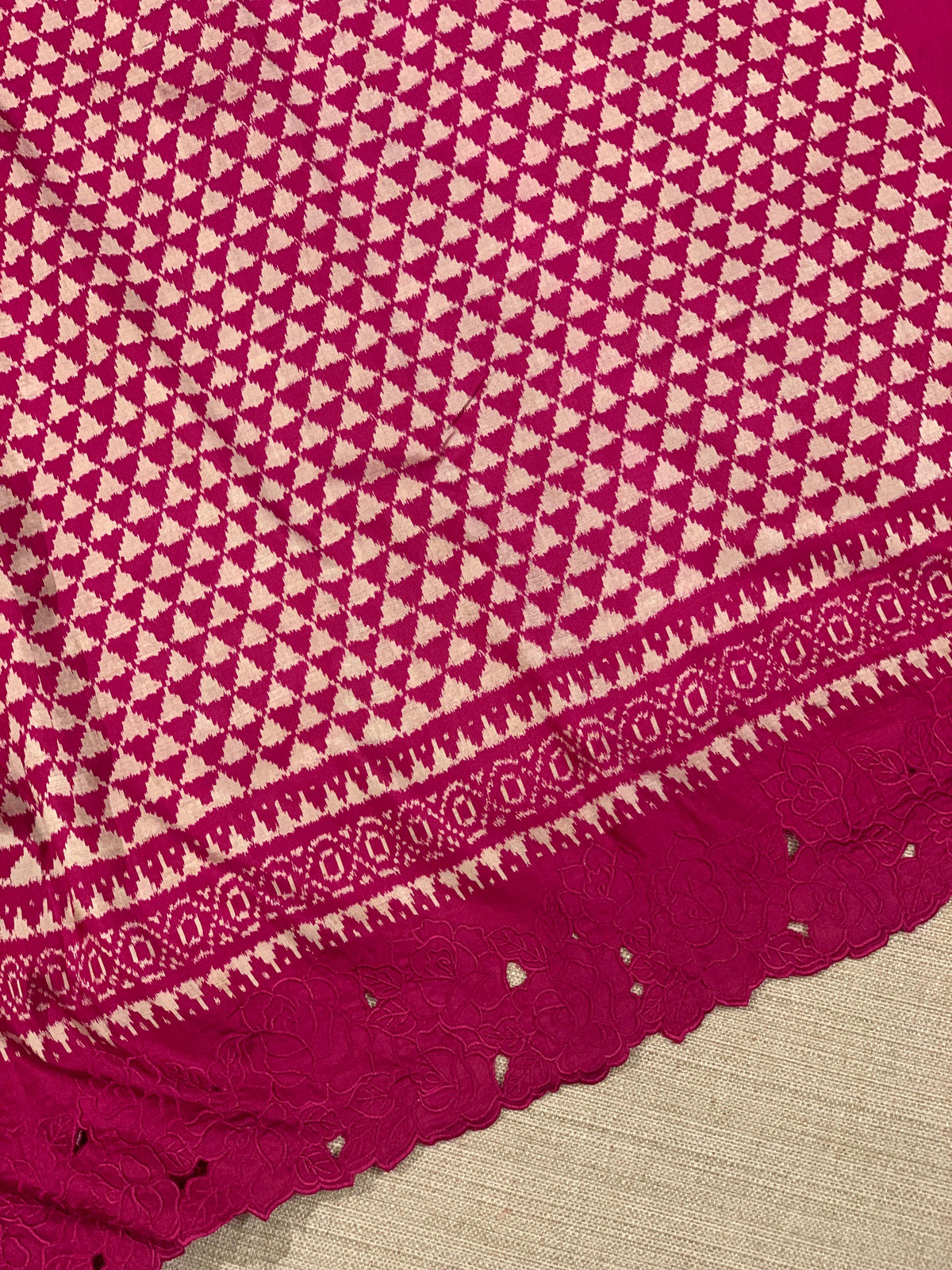 Ruby pink Cambodian–inspired Ikkat Silk Saree with cutwork Rose Border
