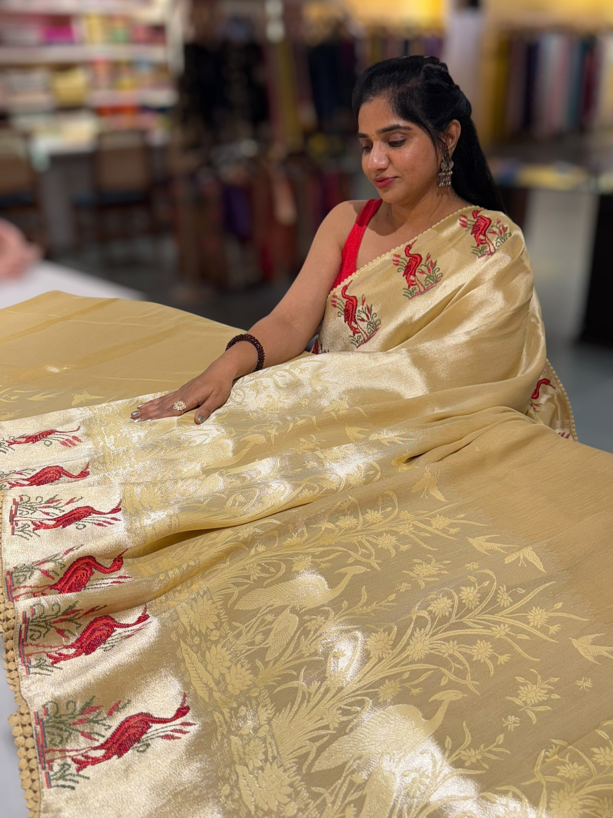 Pastel yellow Banarasi Brocade tissue saree with tonchui style weaving & petite point embroidered swan border