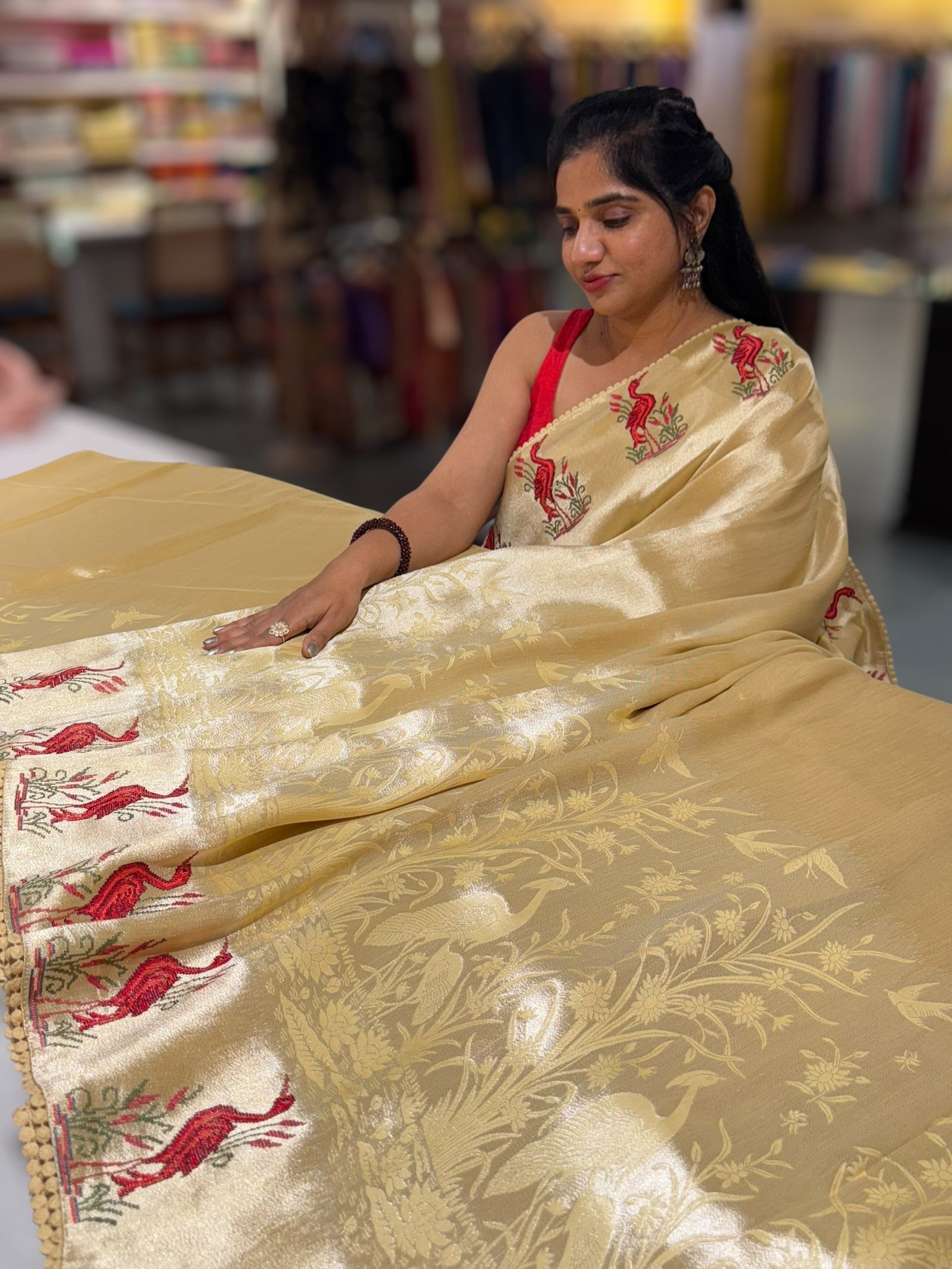 Pastel yellow Banarasi Brocade tissue saree with tonchui style weaving & petite point embroidered swan border