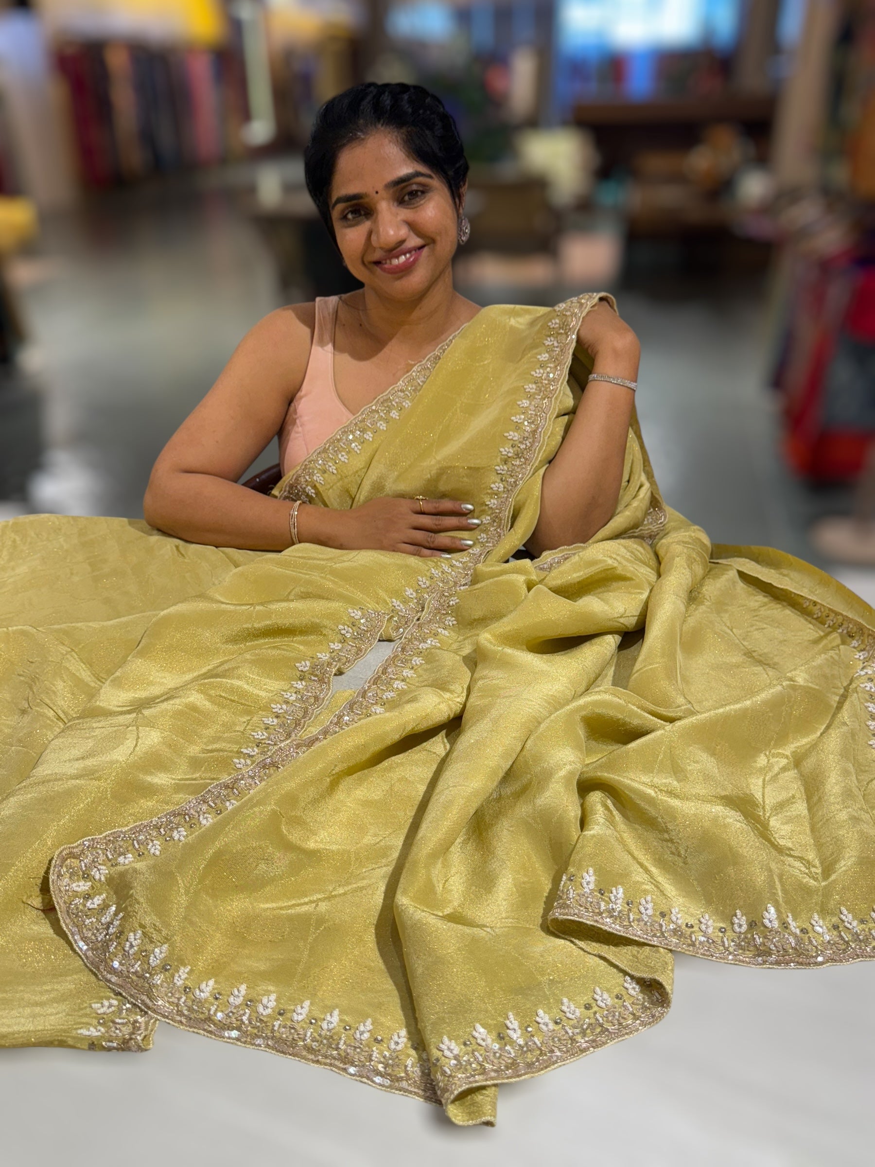 Pastel Yellow Tissue Gorgette Saree With Hanwork Border and Blouse.
