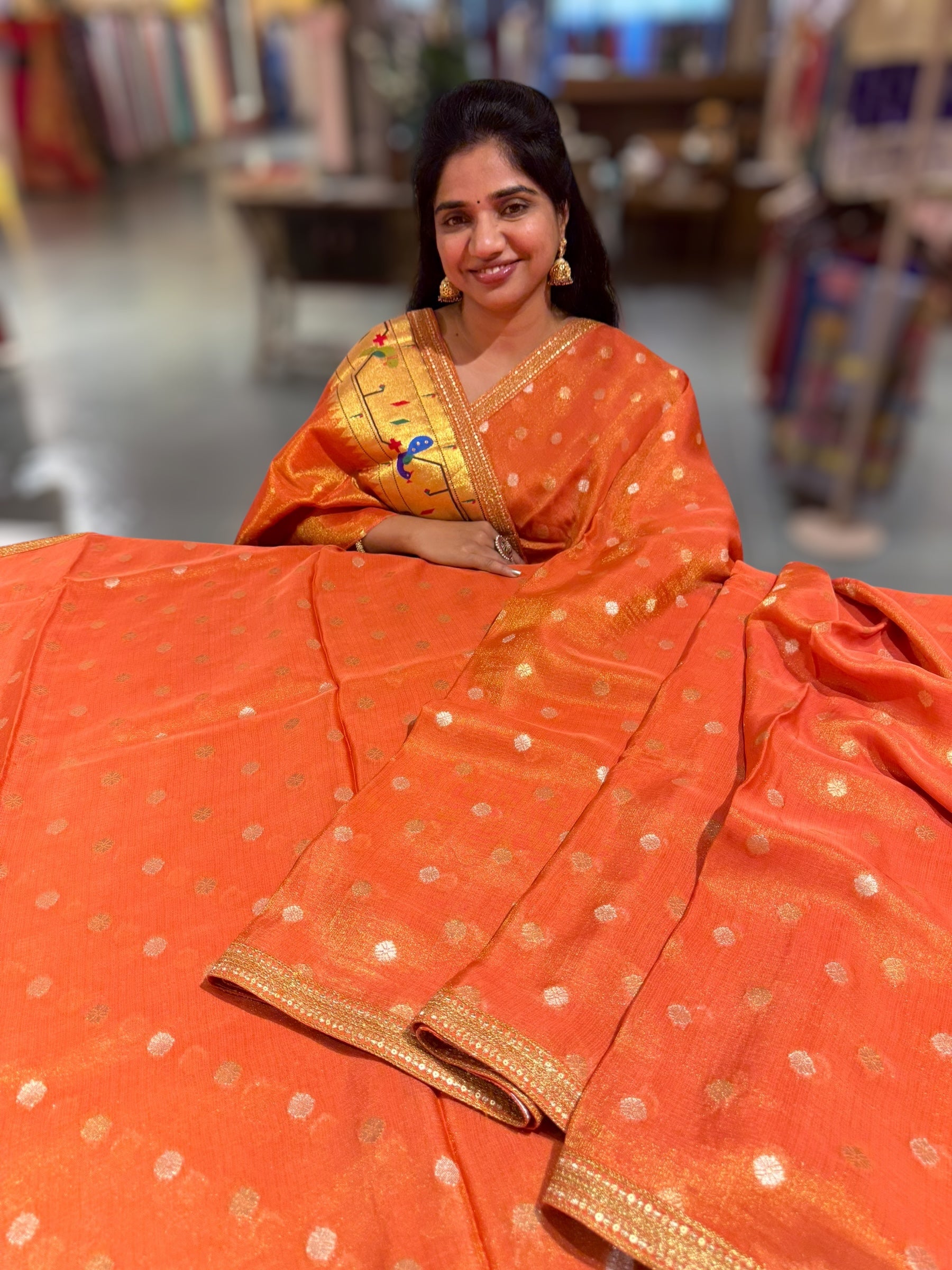 Orange tissue Kota saree with sabyasachi borders and fancy Pythani tissue blosue