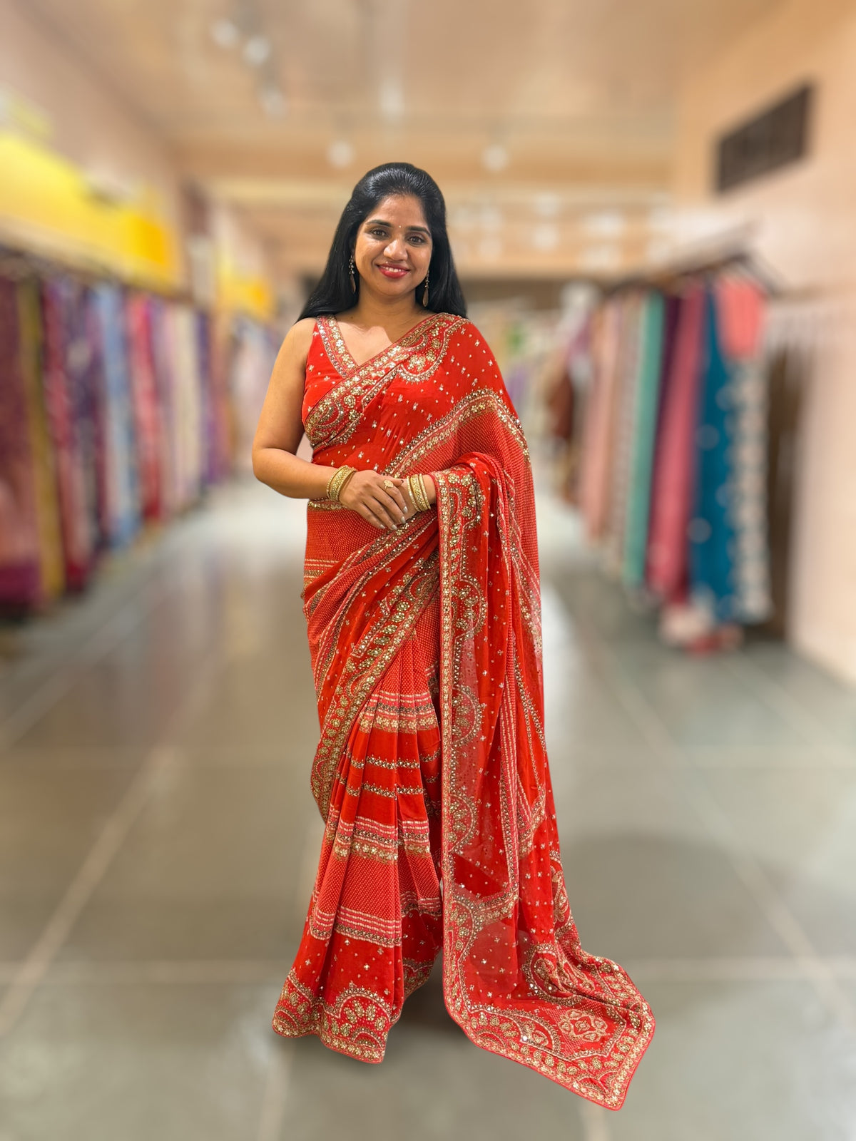 Orangish Red Kareena Inspired Gorgette Saree with allover mirrors