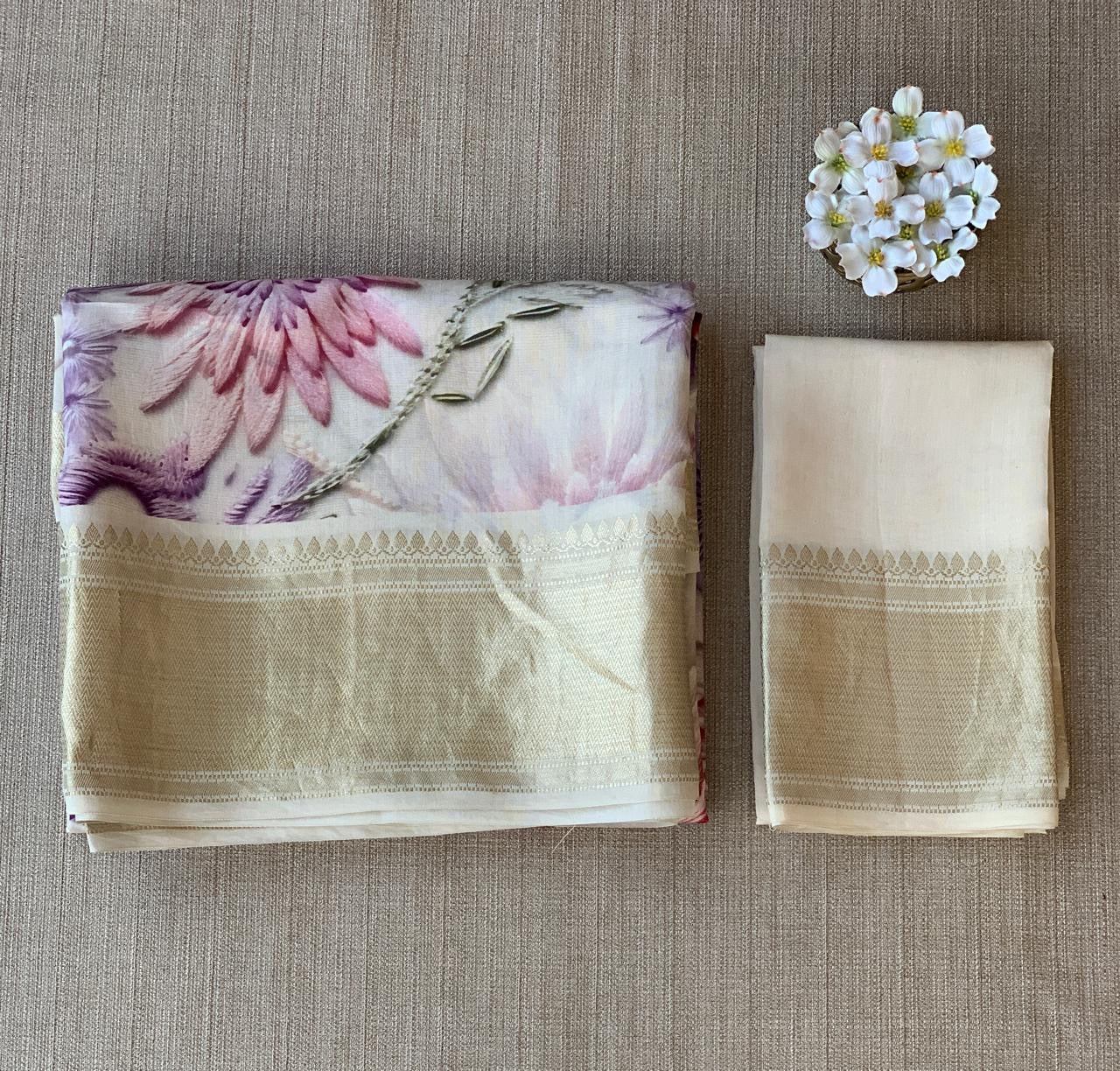 Ivory Pure Handloom Chiniya Silk Saree with stunning Floral Print and zari borders