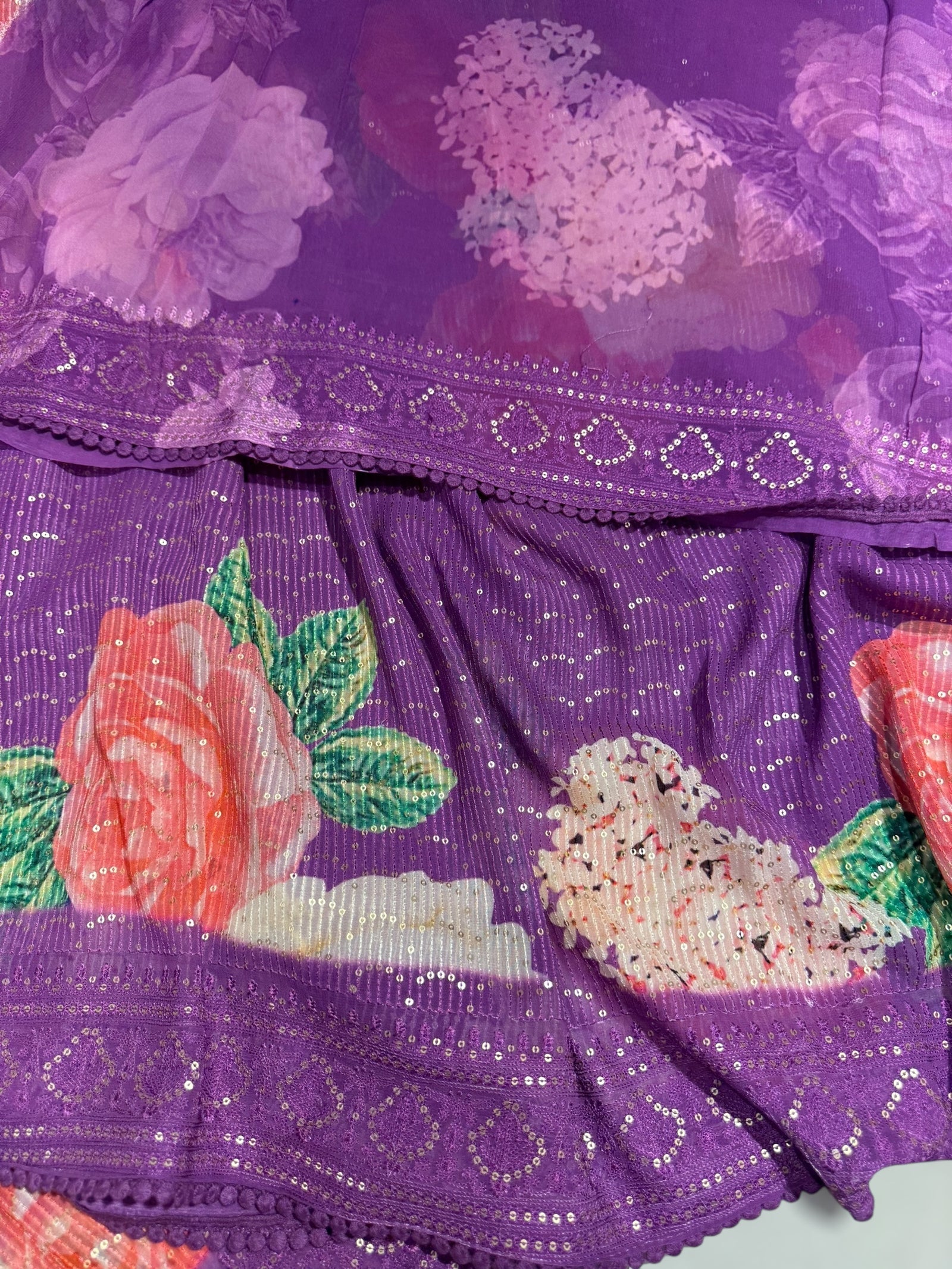 Purple georgette sequence saree with statement floral print