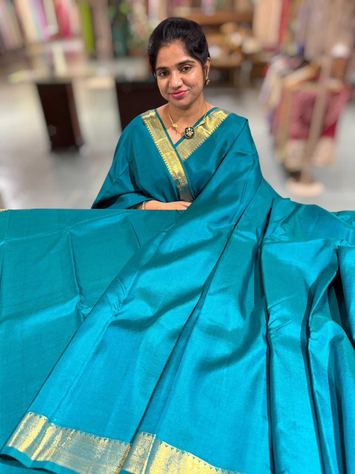 Peacock Green vintage Kanchipuram silk saree with pen kalamkari blouse
