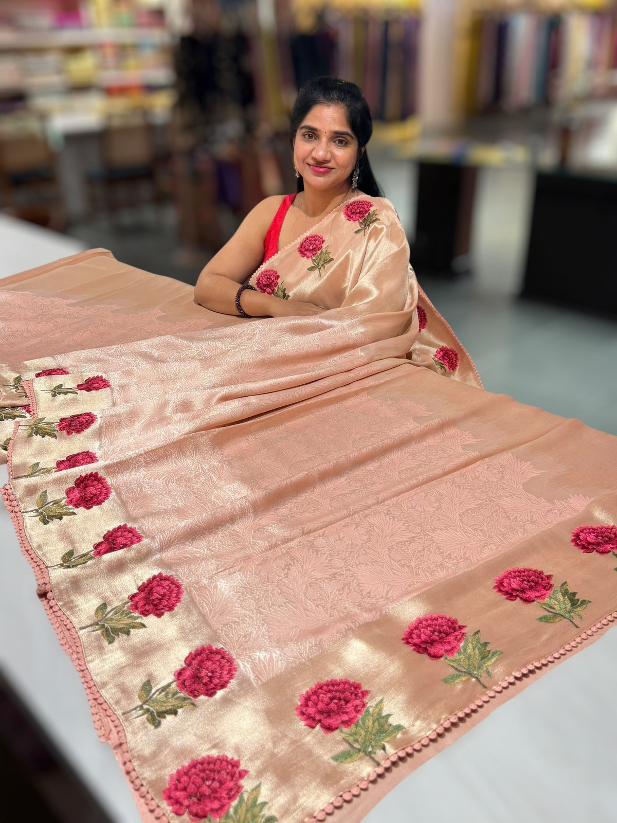 Peach pink Banarasi Brocade tissue saree with tonchui style weaving & embroidered dahlia flower border
