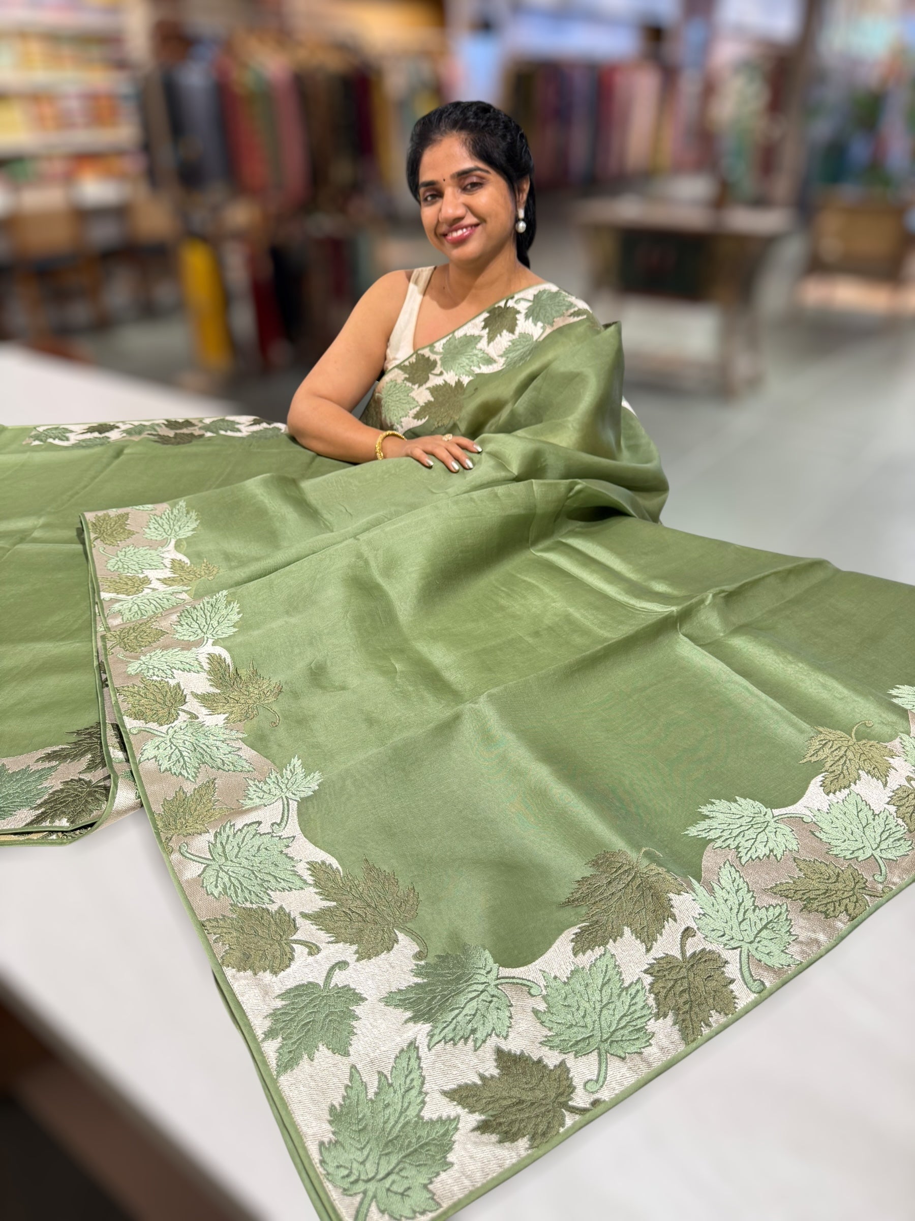 Sage Green Organza Saree with Stunning Leaf Embroidered Border