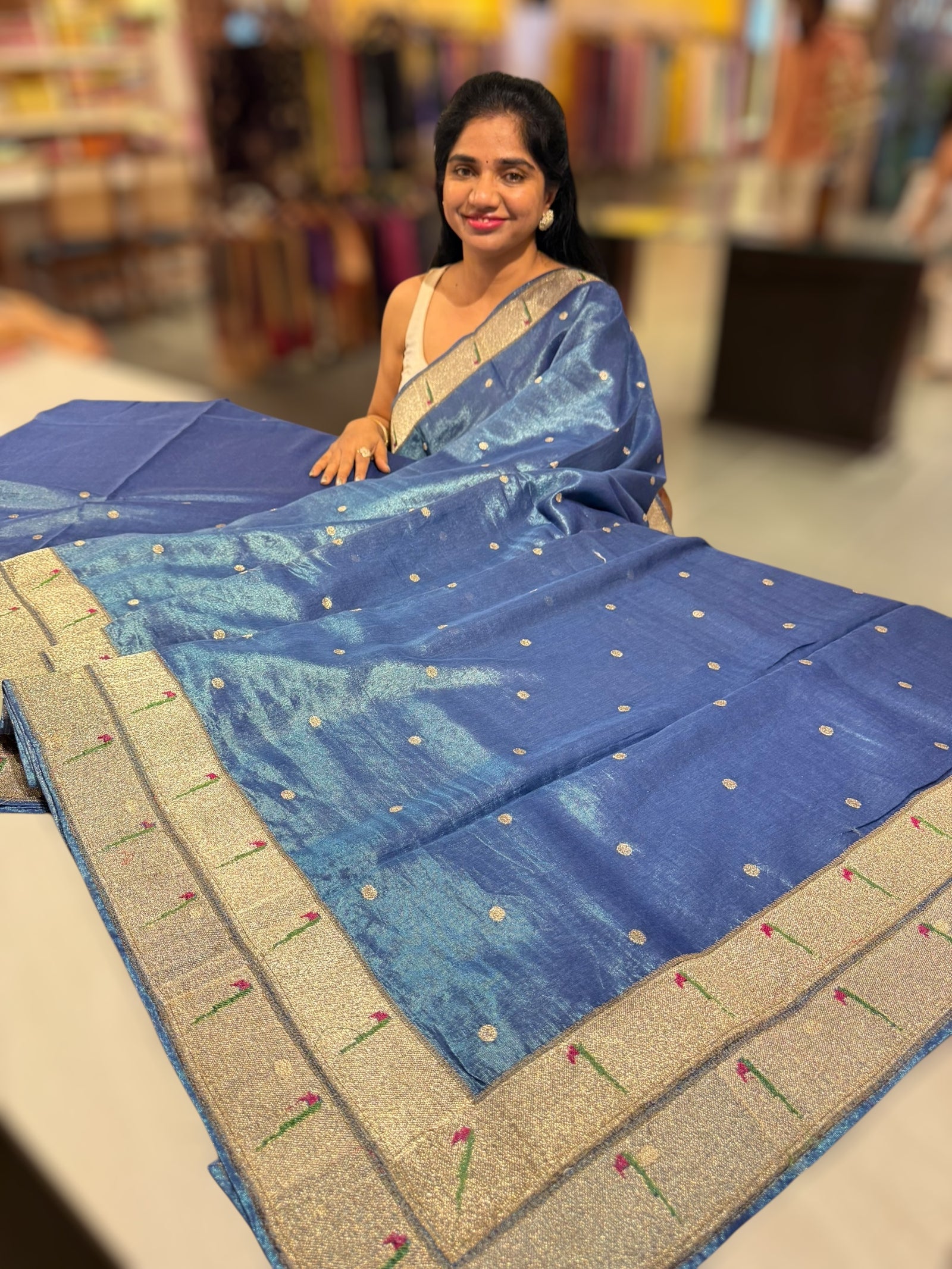 Blue Tissue Saree with pythani inspired muniya borders