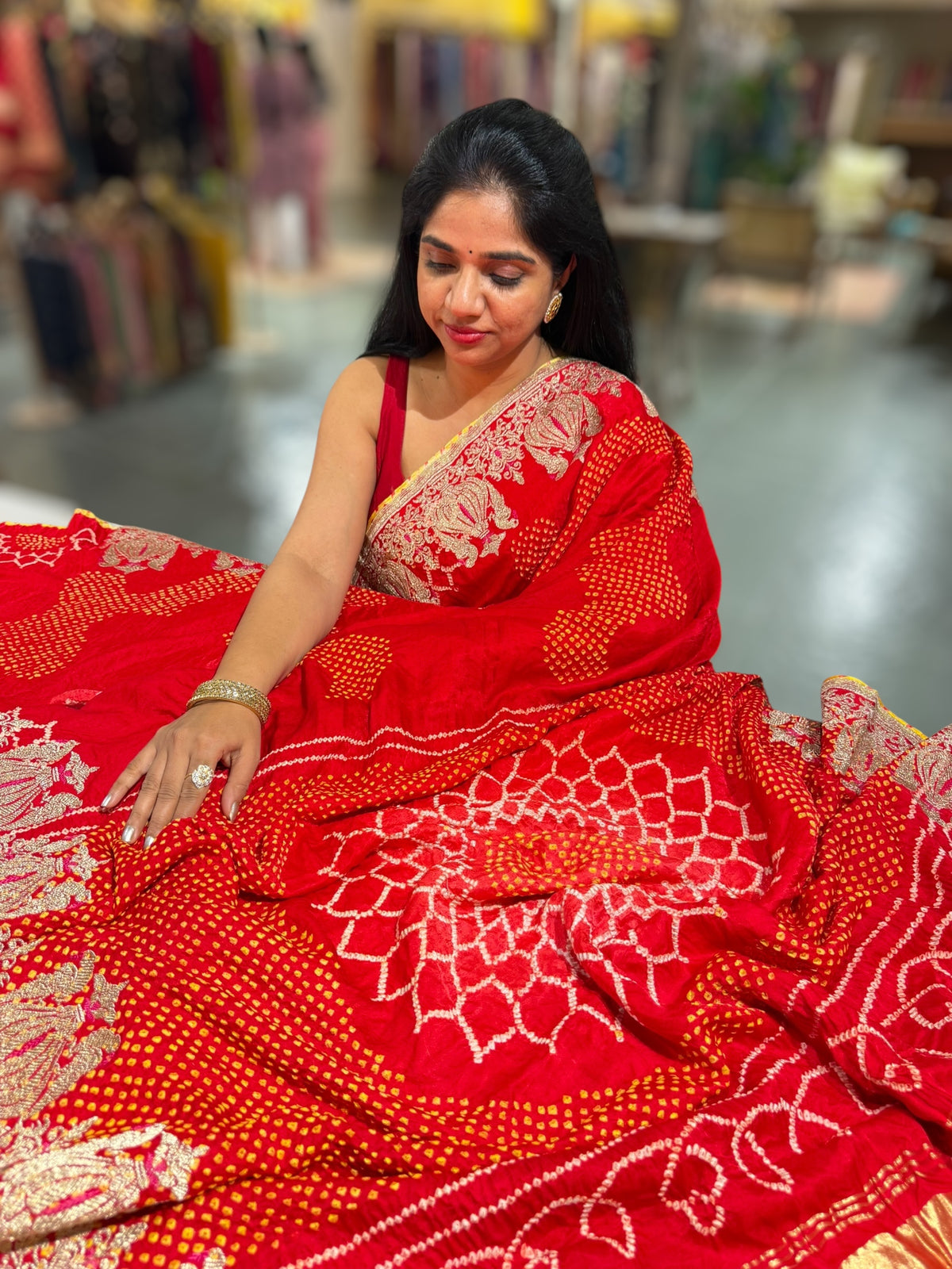 Orangish Red Designer Rai Bandhej Saree With Embroidered Border