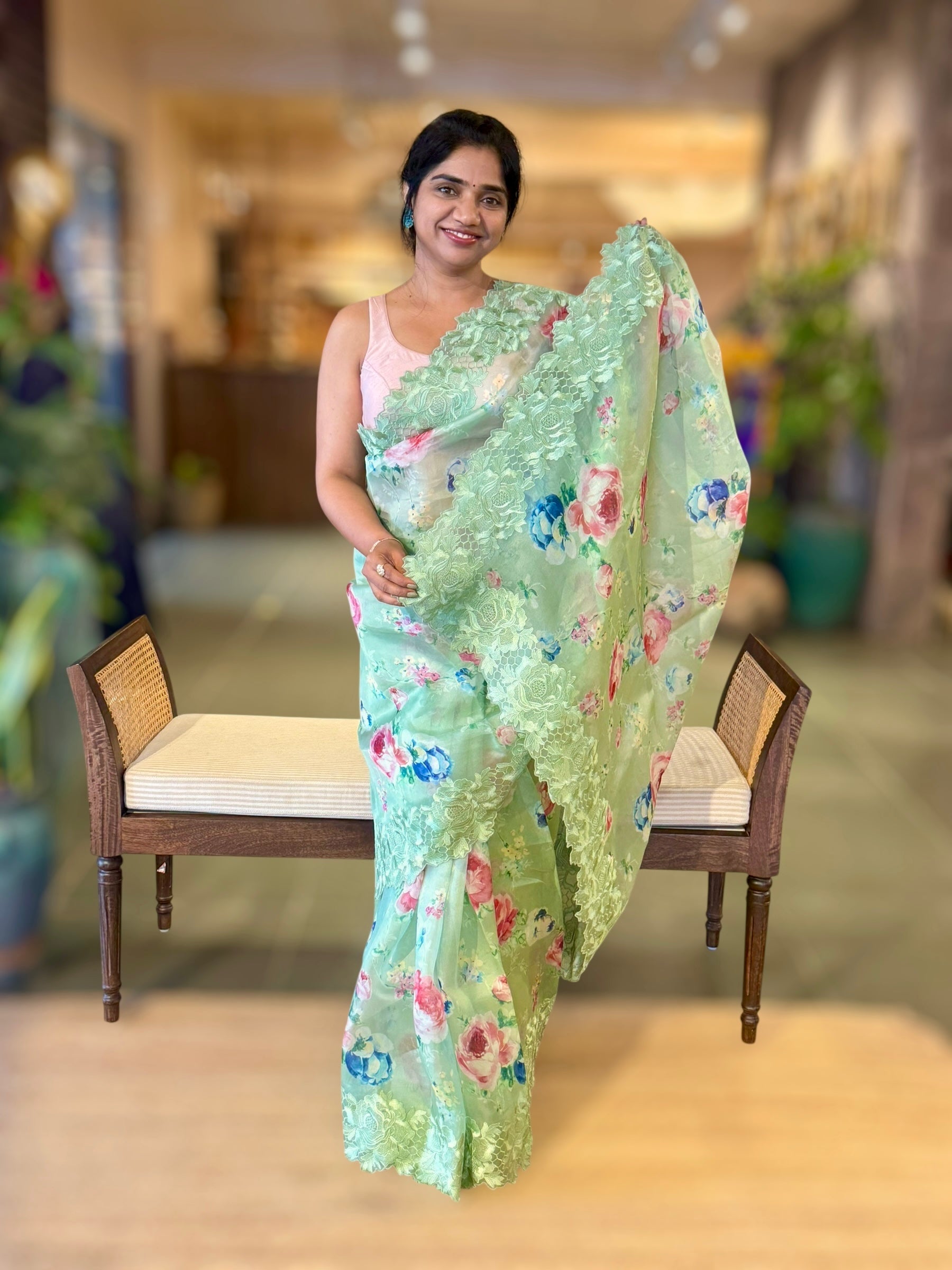 Mint Floral Printed Organza Saree With Chantilly Lace Style Embroidered Border.