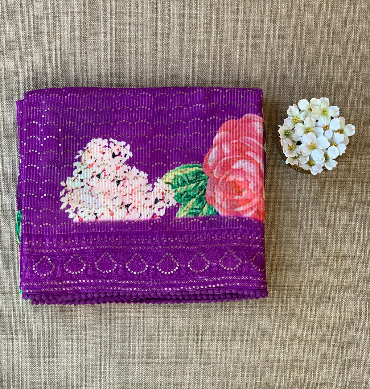 Purple georgette sequence saree with statement floral print