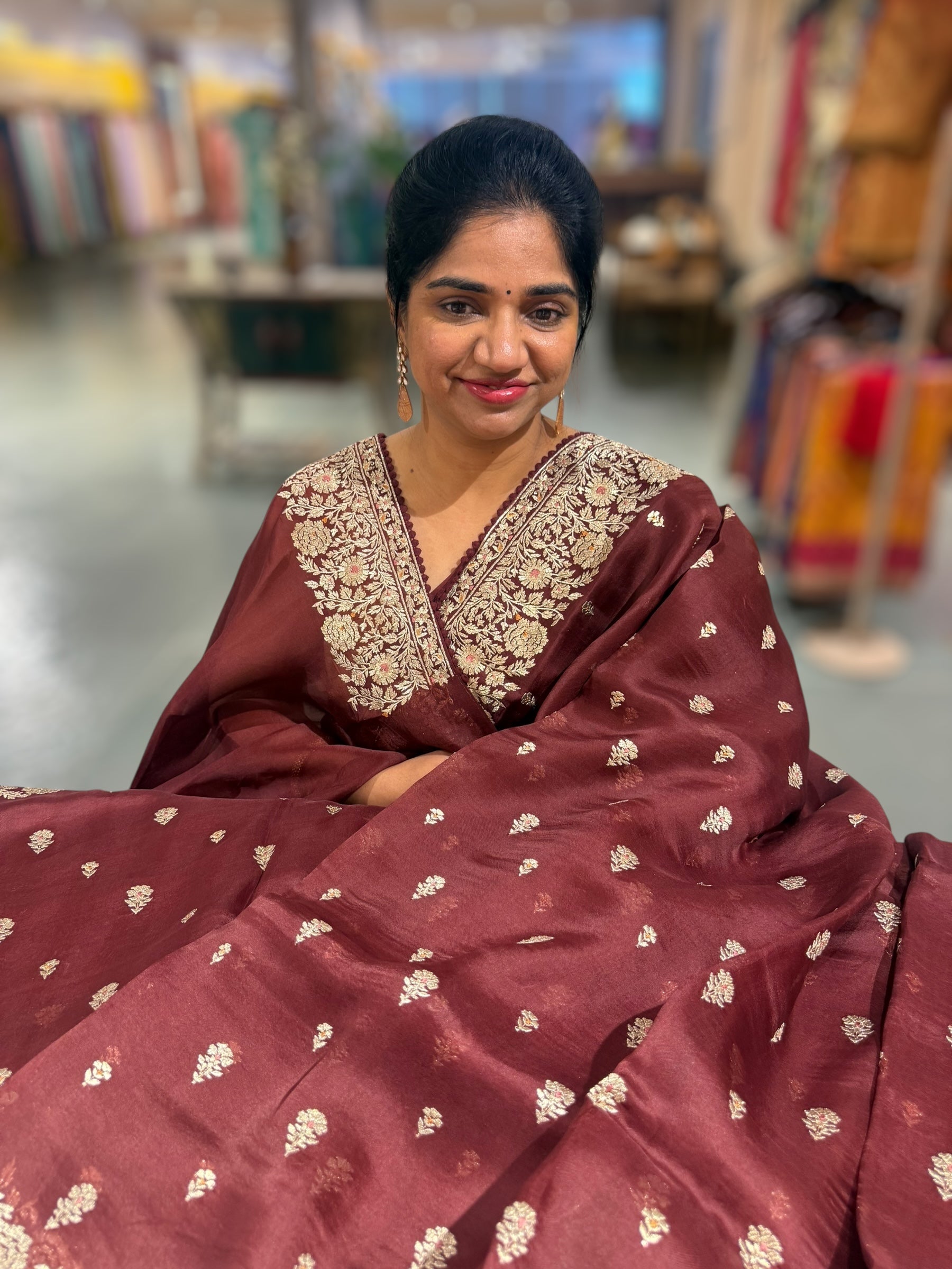 Meroonish Brown  Organza Saree with stunning heavy zari embroidered border and alloevr motifs