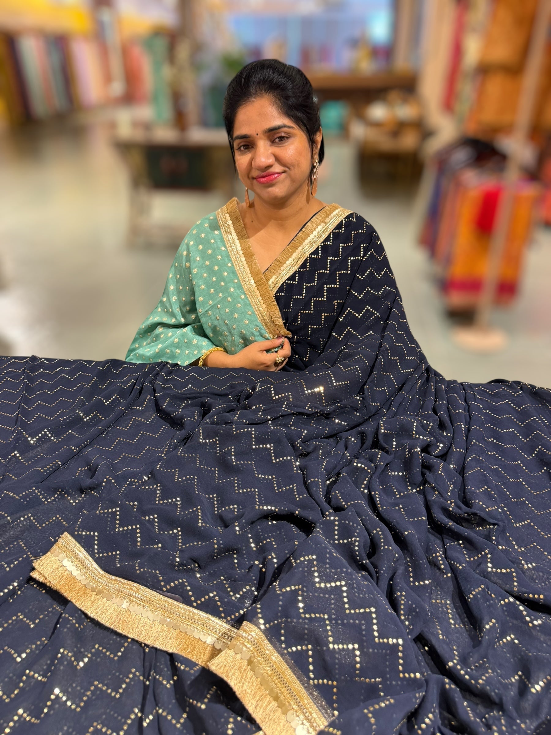 Navy Georgette Saree with stick on Badla in zigzag pattern