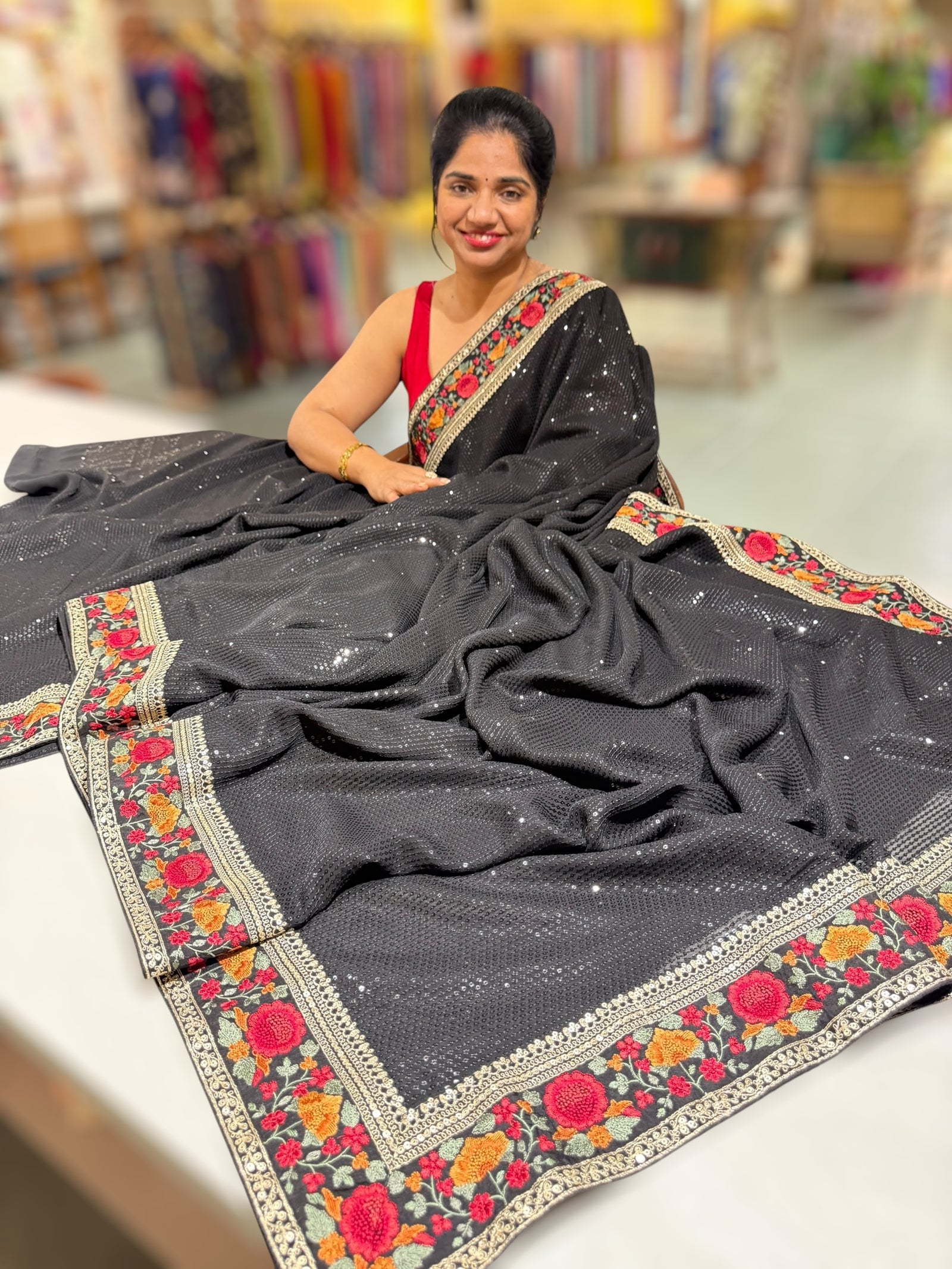 Black Georgette sequnce Saree with Sabyasachi borders and Blouse