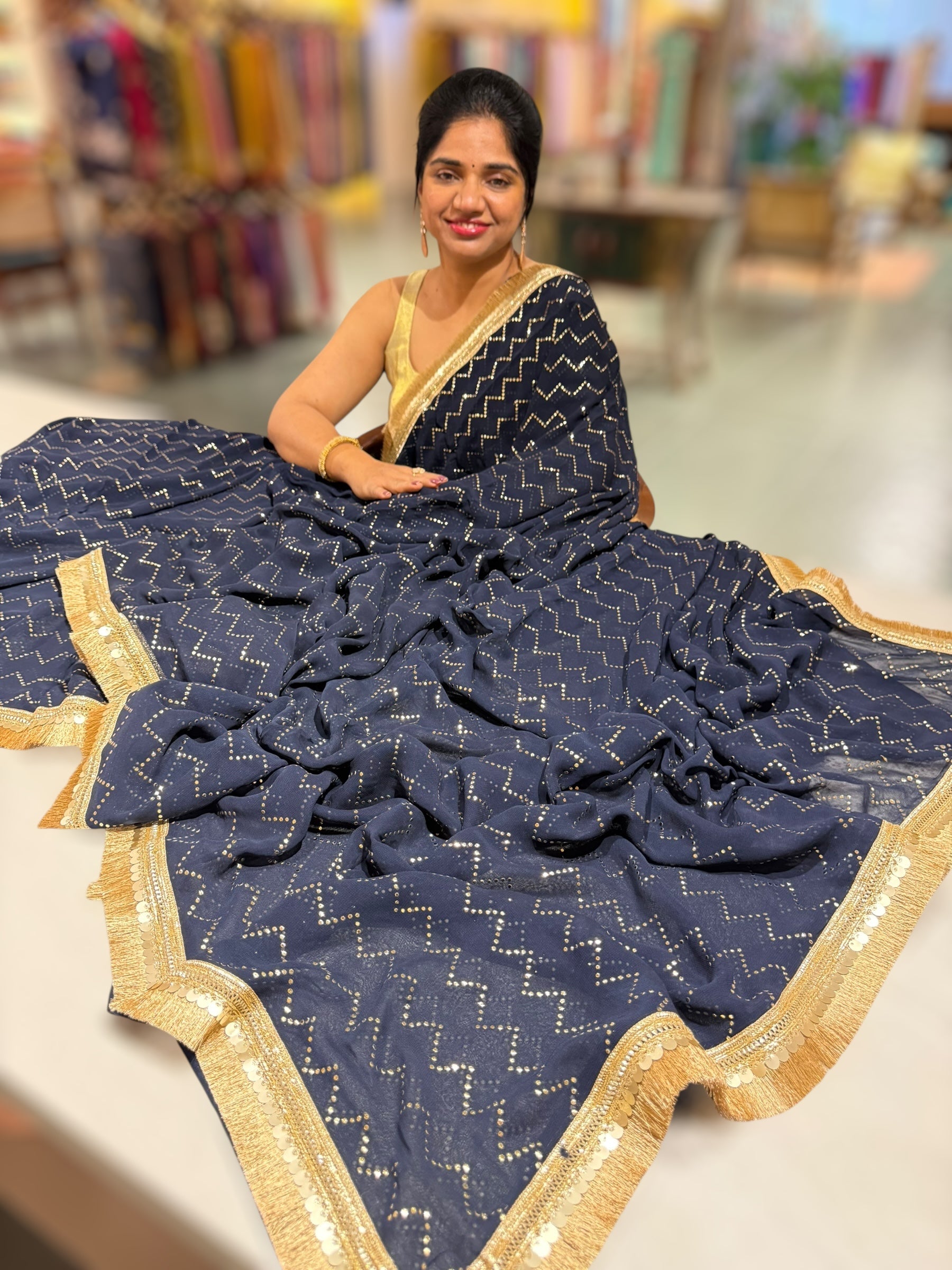 Navy Georgette Saree with stick on Badla in zigzag pattern