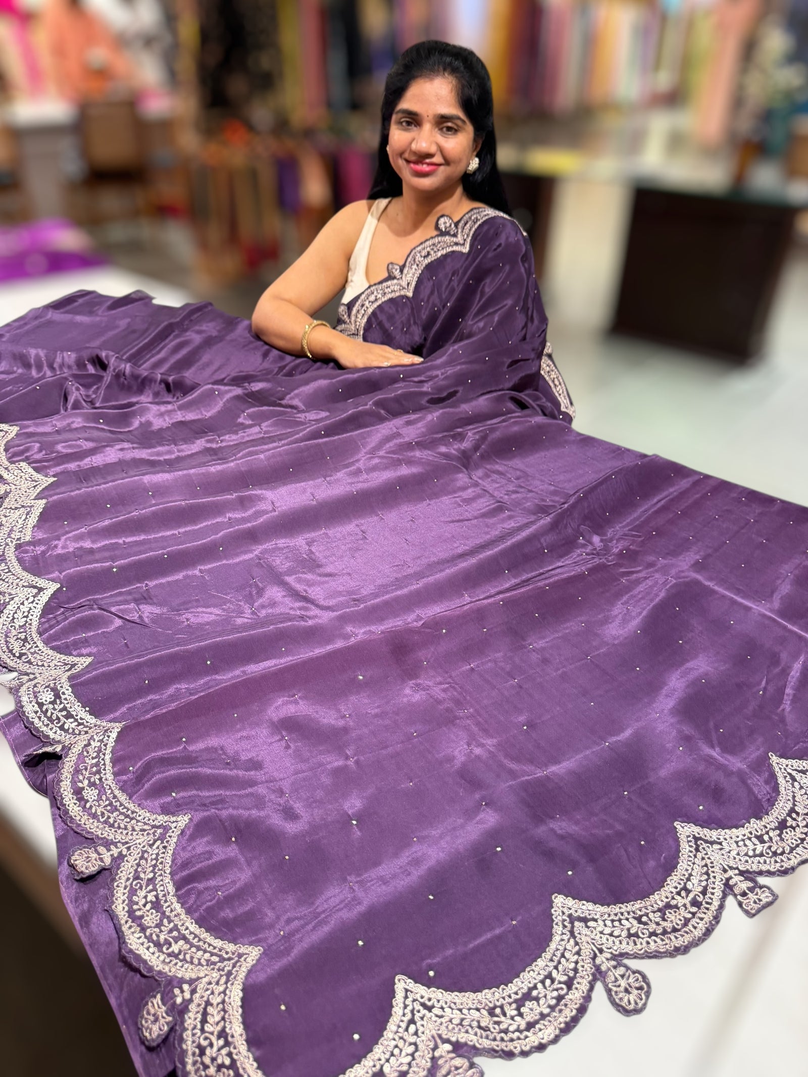 Plum crepe silk saree with scalloped pita border