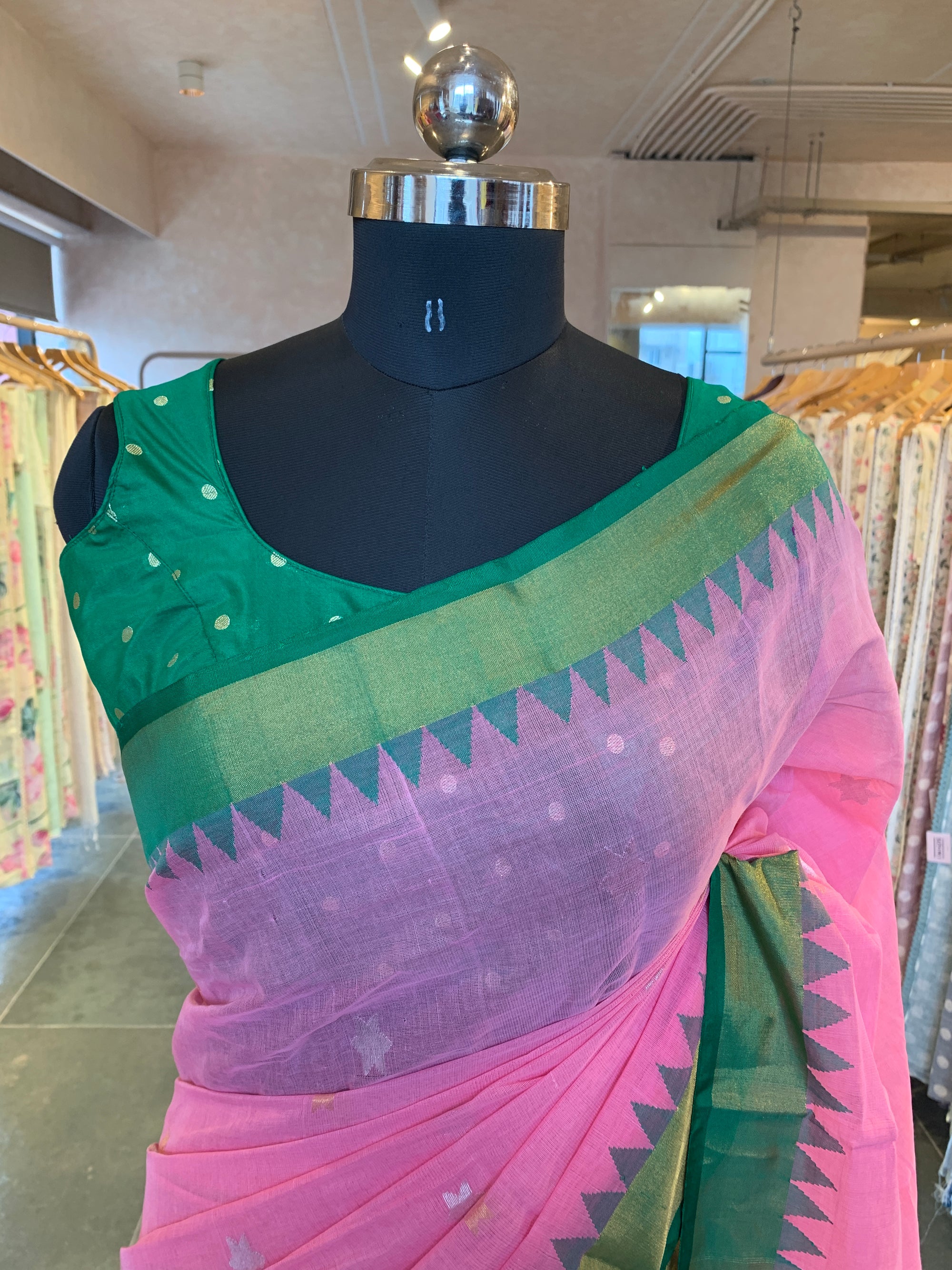 Handwoven Ponduru Khadi Saree in Blush Pink with Floral Accents and Green Border