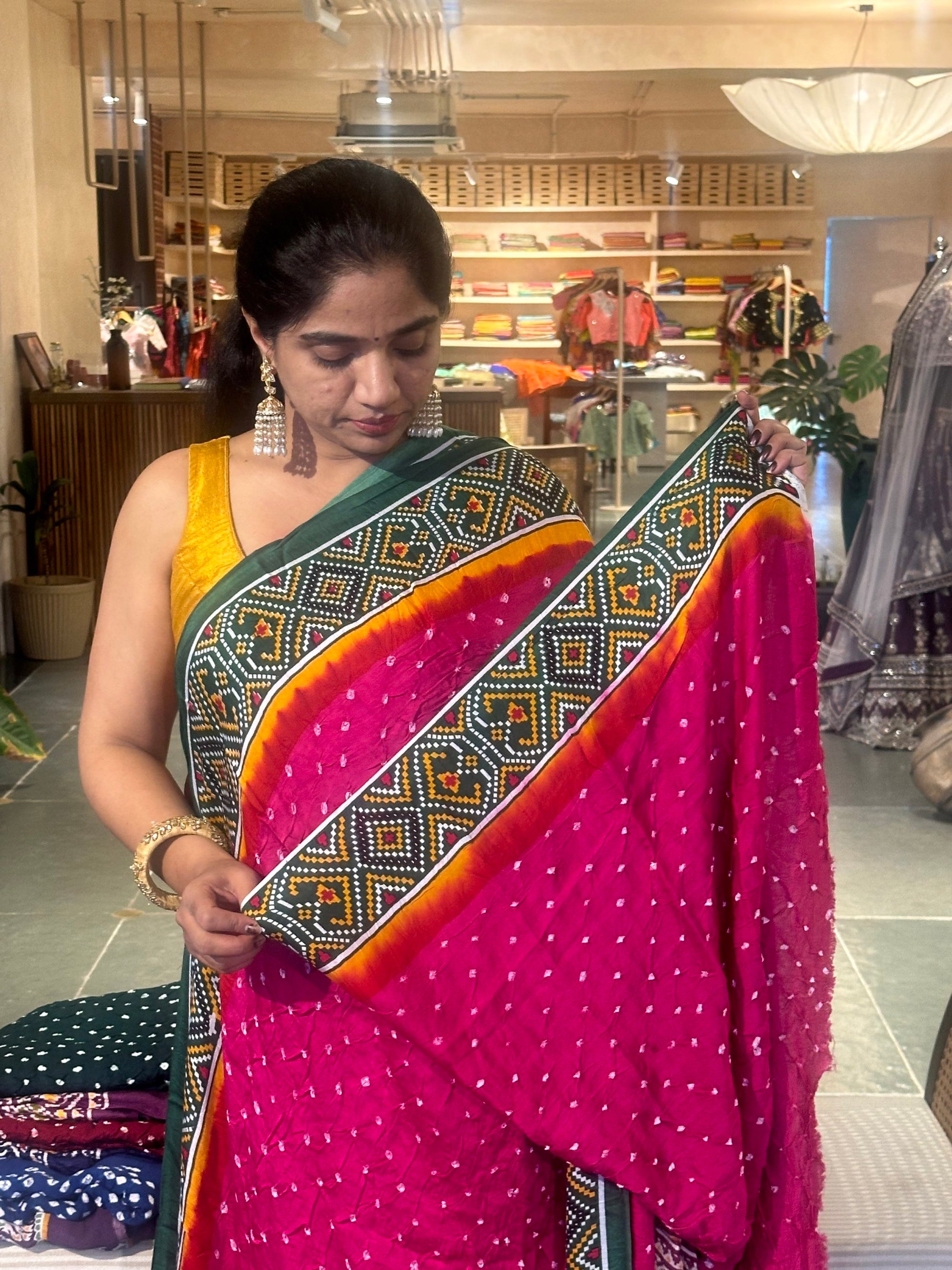 Modal satin Bandhej saree with patola printed border and pallu