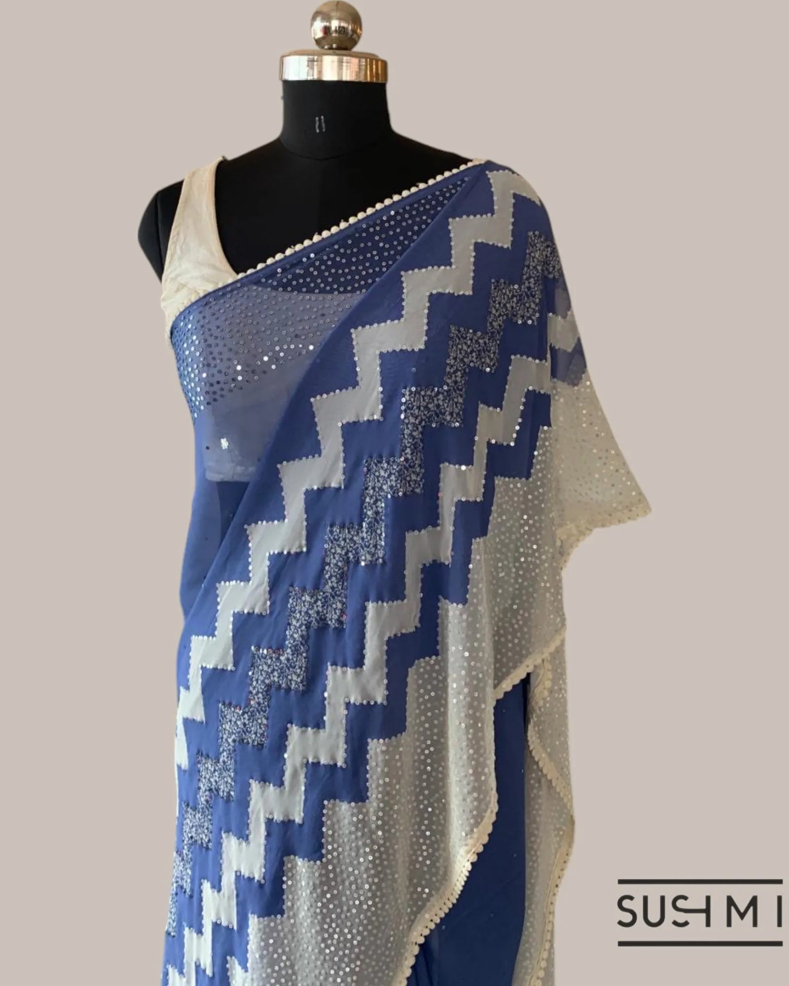 Blue Pure Gorgette Saree With Zigzag Pattern Sequnce Border
