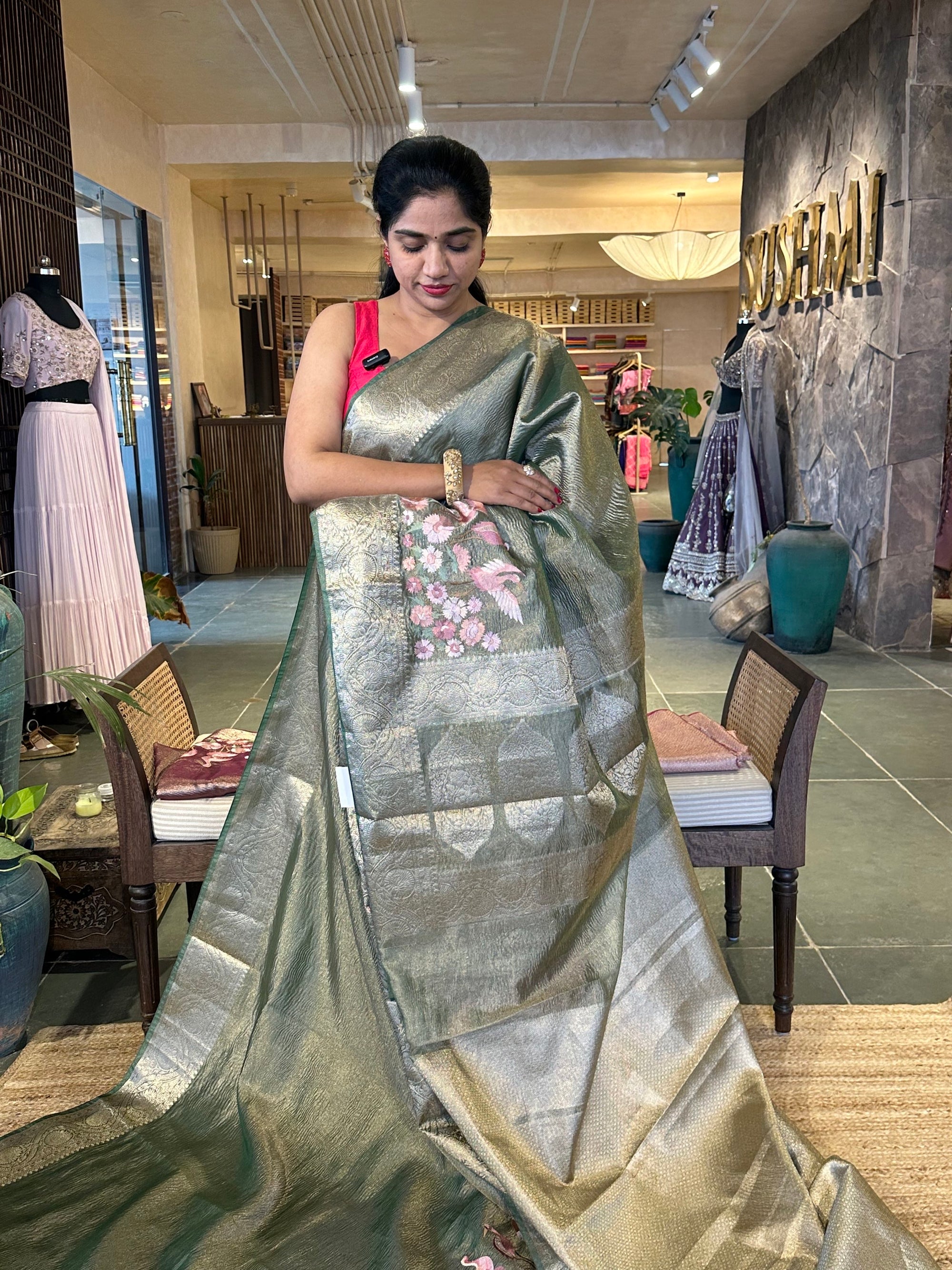 Green Crush Tissue Saree with traditional and embroidered borders