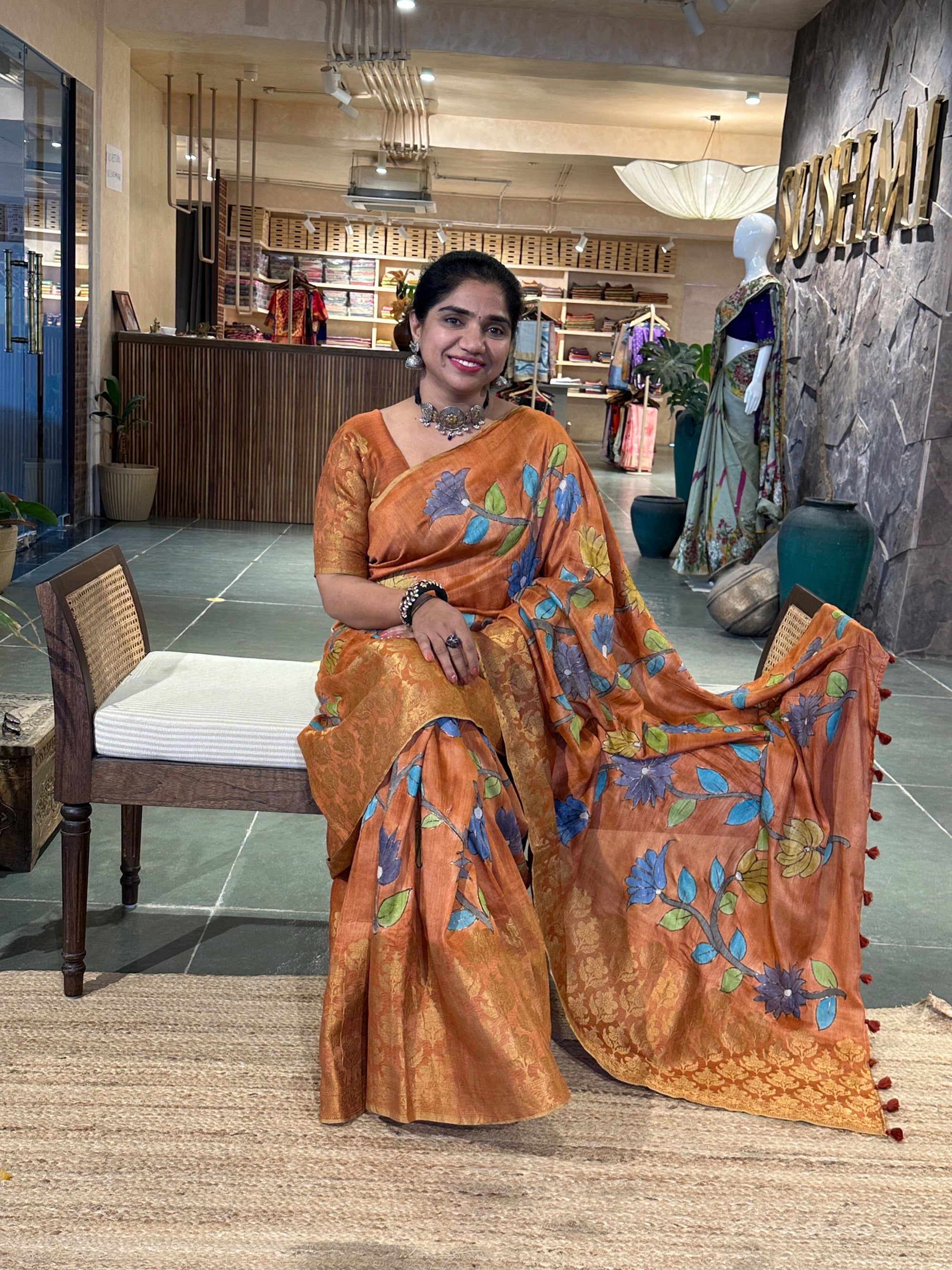 Rust Orange Pure Handloom Munga Banarasi Saree with pichwai handpainting .