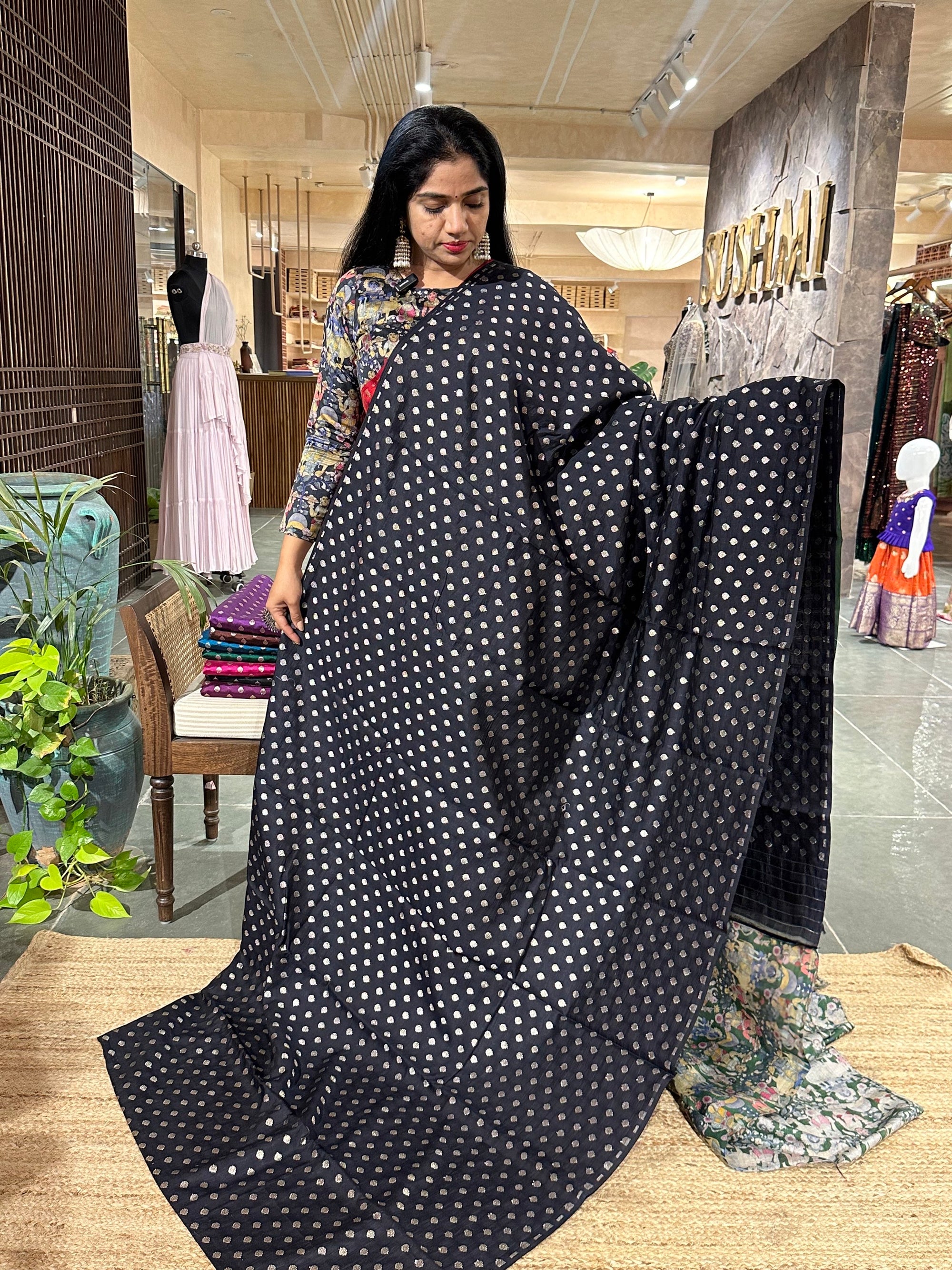 Banarasi chinia silk with krishna theme pallu-Black and emerald Green