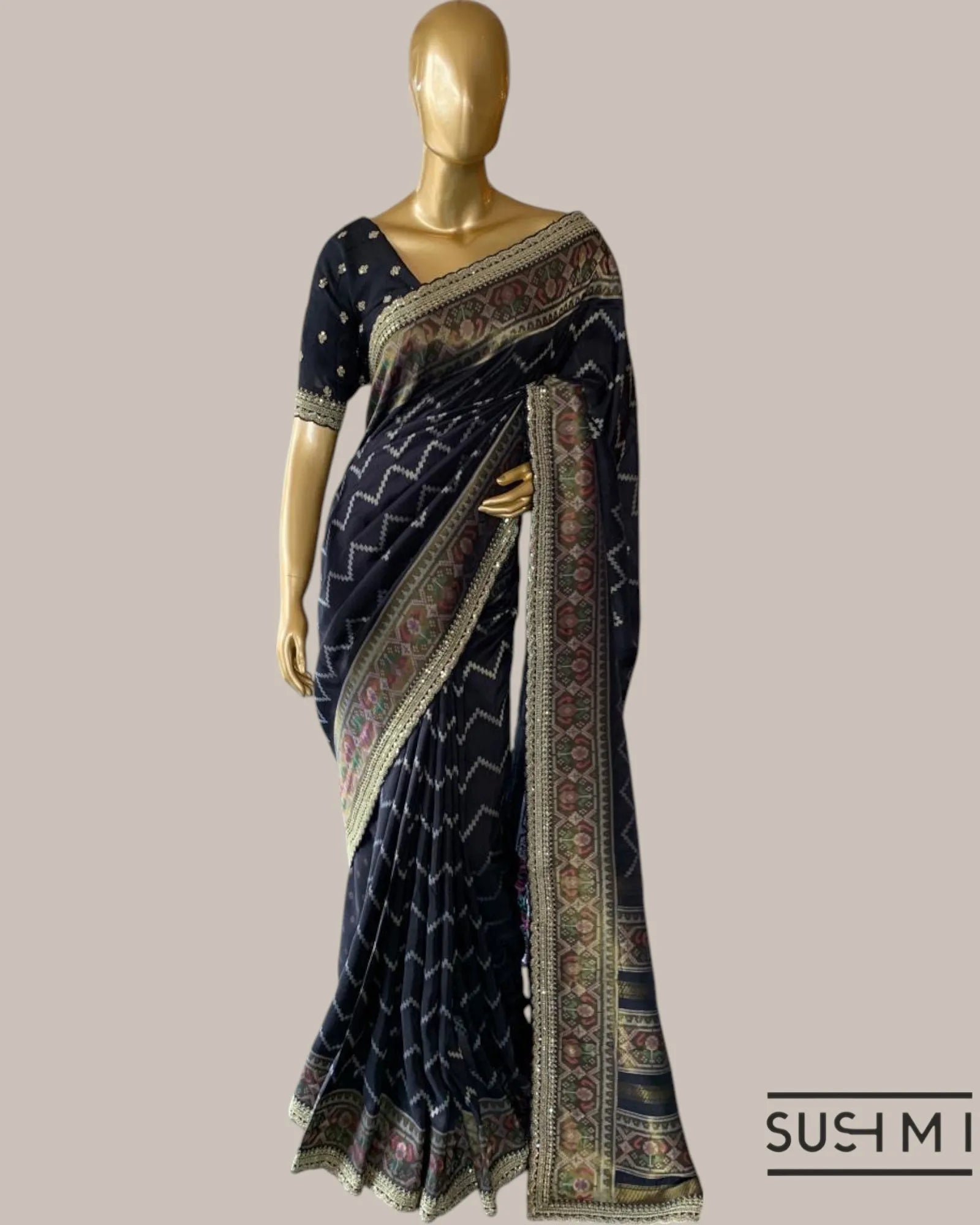 Black Falling Tussar Silk Gorgette Saree in Ikkath Patola style Chevron body and