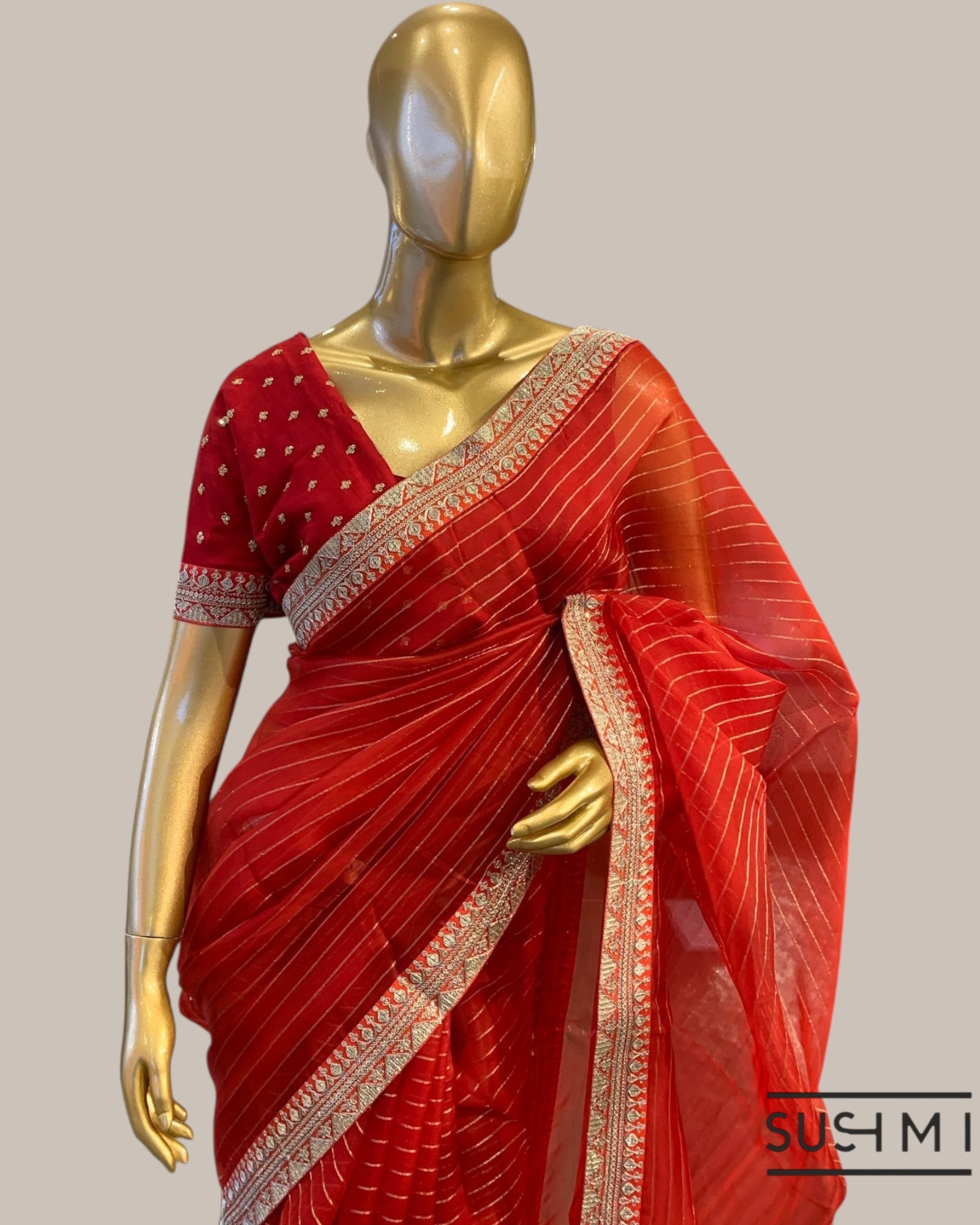 Red Organza Saree with Zari stripes Hemlined with sabhyasachi border and blouse