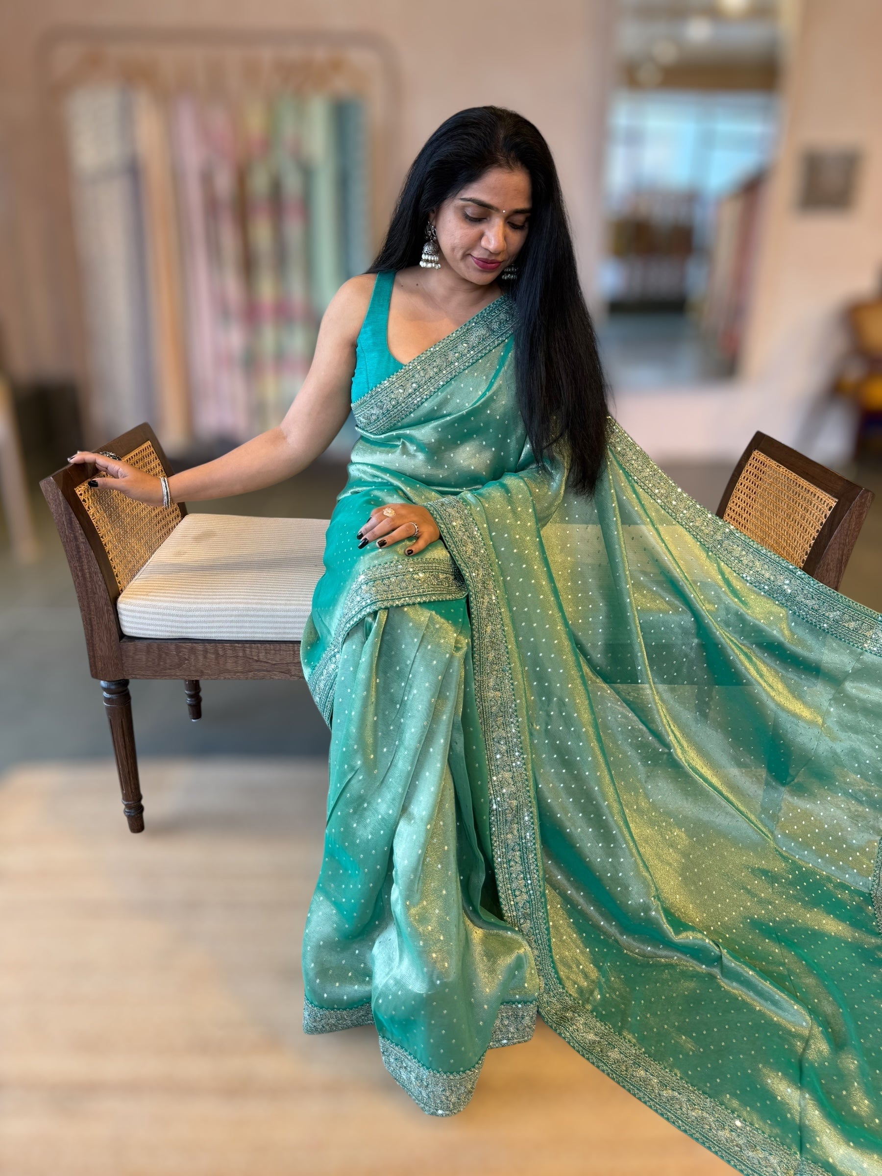 Teal Tissue Gorgette saree with sabyasachi borders and allover pitawork blouse