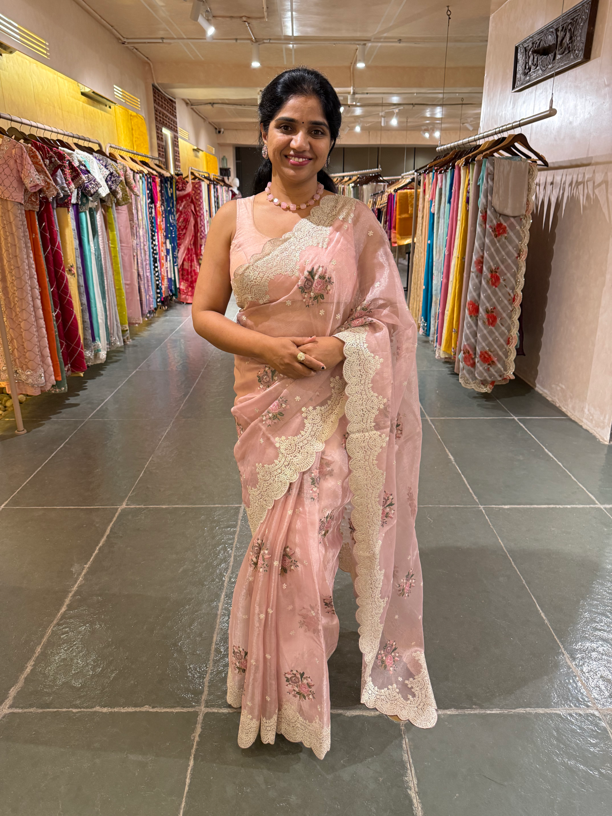 Pink Tissue Saree With allover Petite Point Motifs & Pittai Sequnce Borders