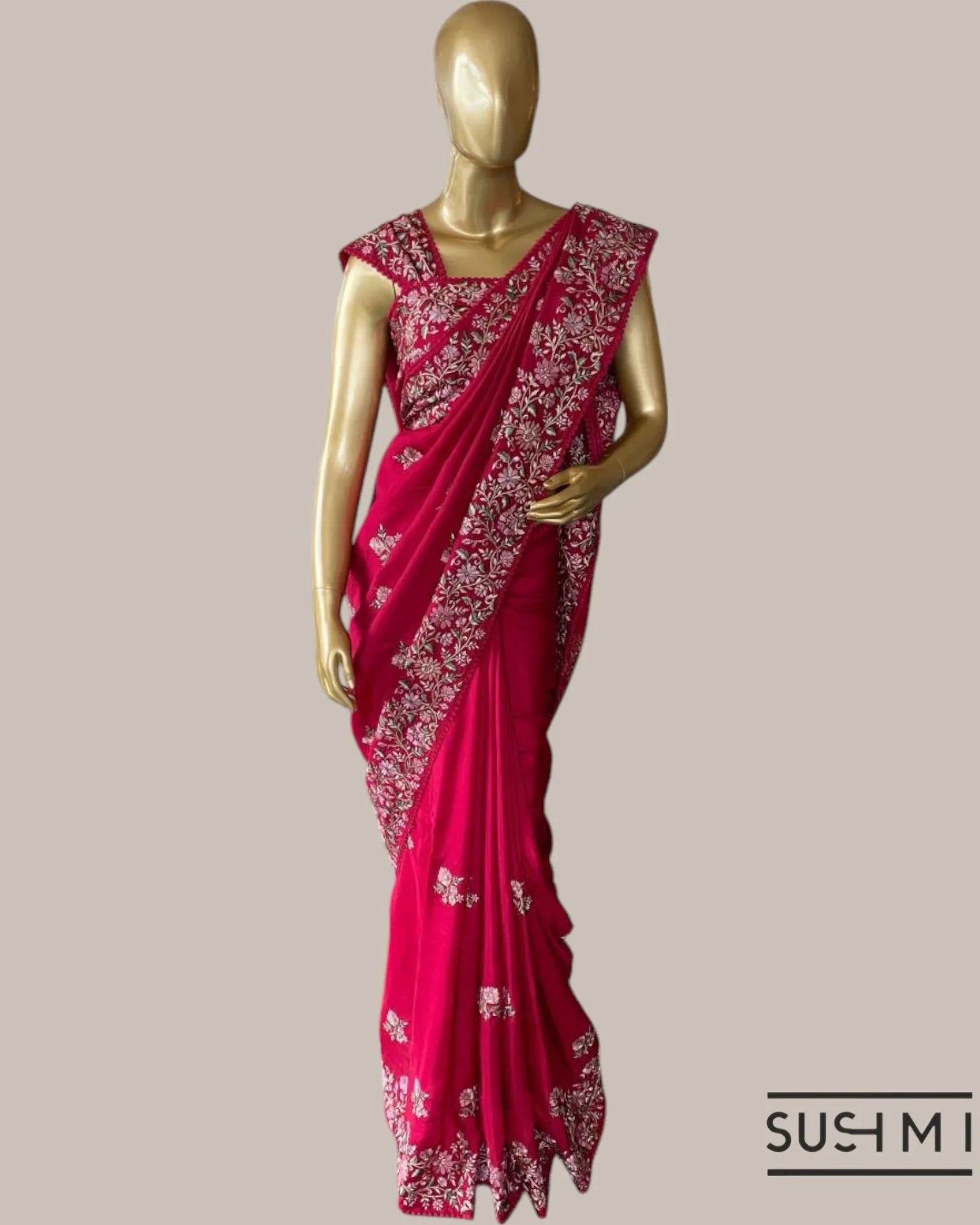 Ruby Pink Tussar Organza Saree with beautiful multi color embroidered border hem