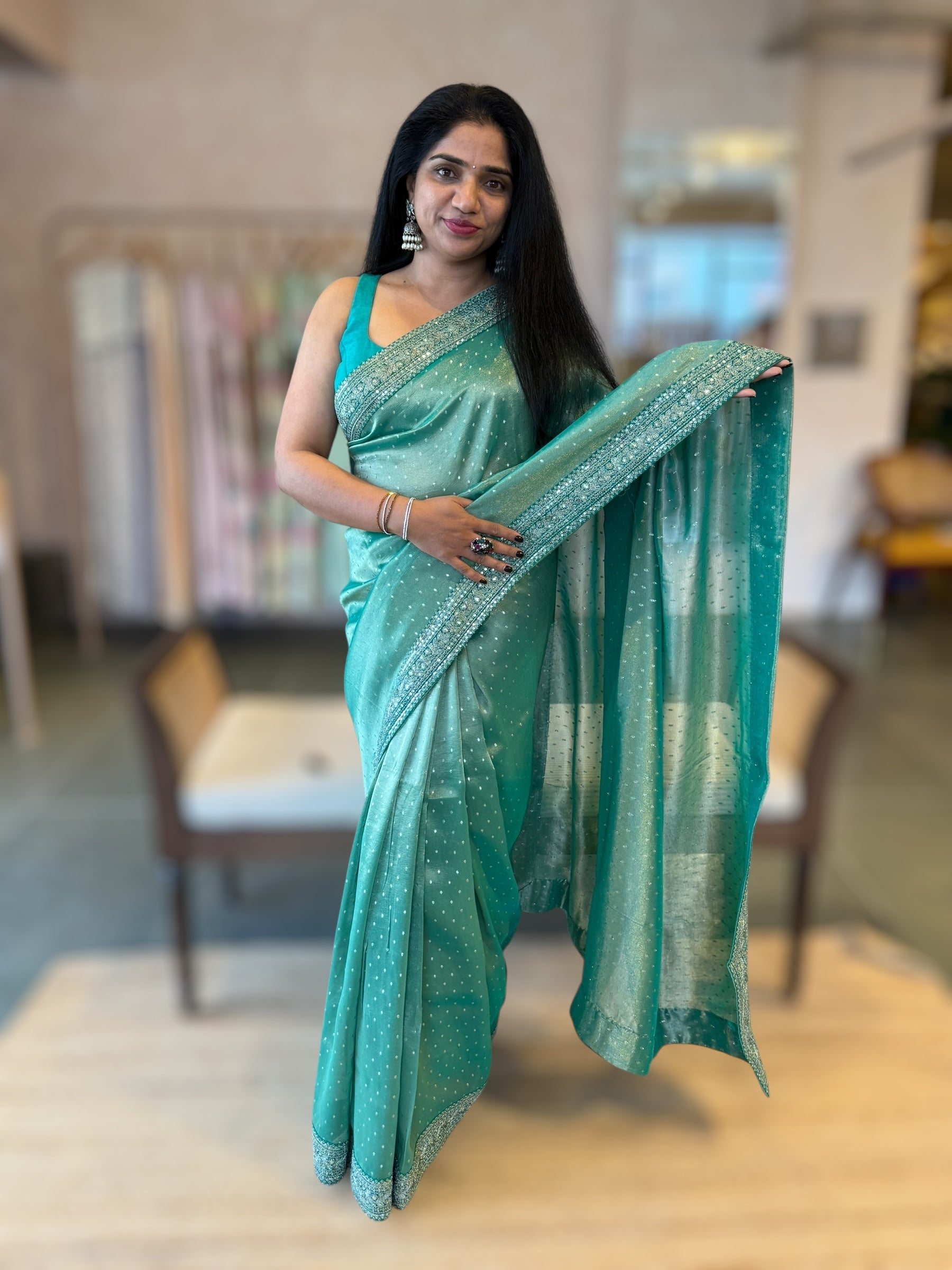 Teal Tissue Gorgette saree with sabyasachi borders and allover pitawork blouse