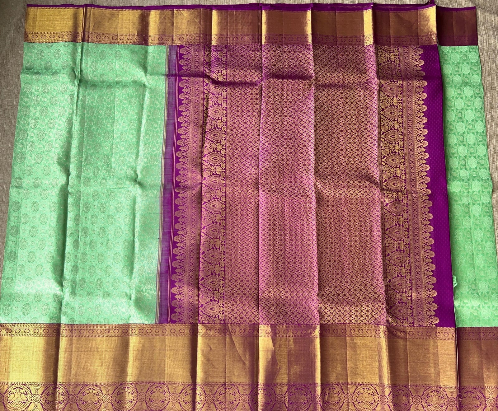 Mint Green Kanchi Pattu Brocade Saree with Rich Purple Zari Border & Pallu