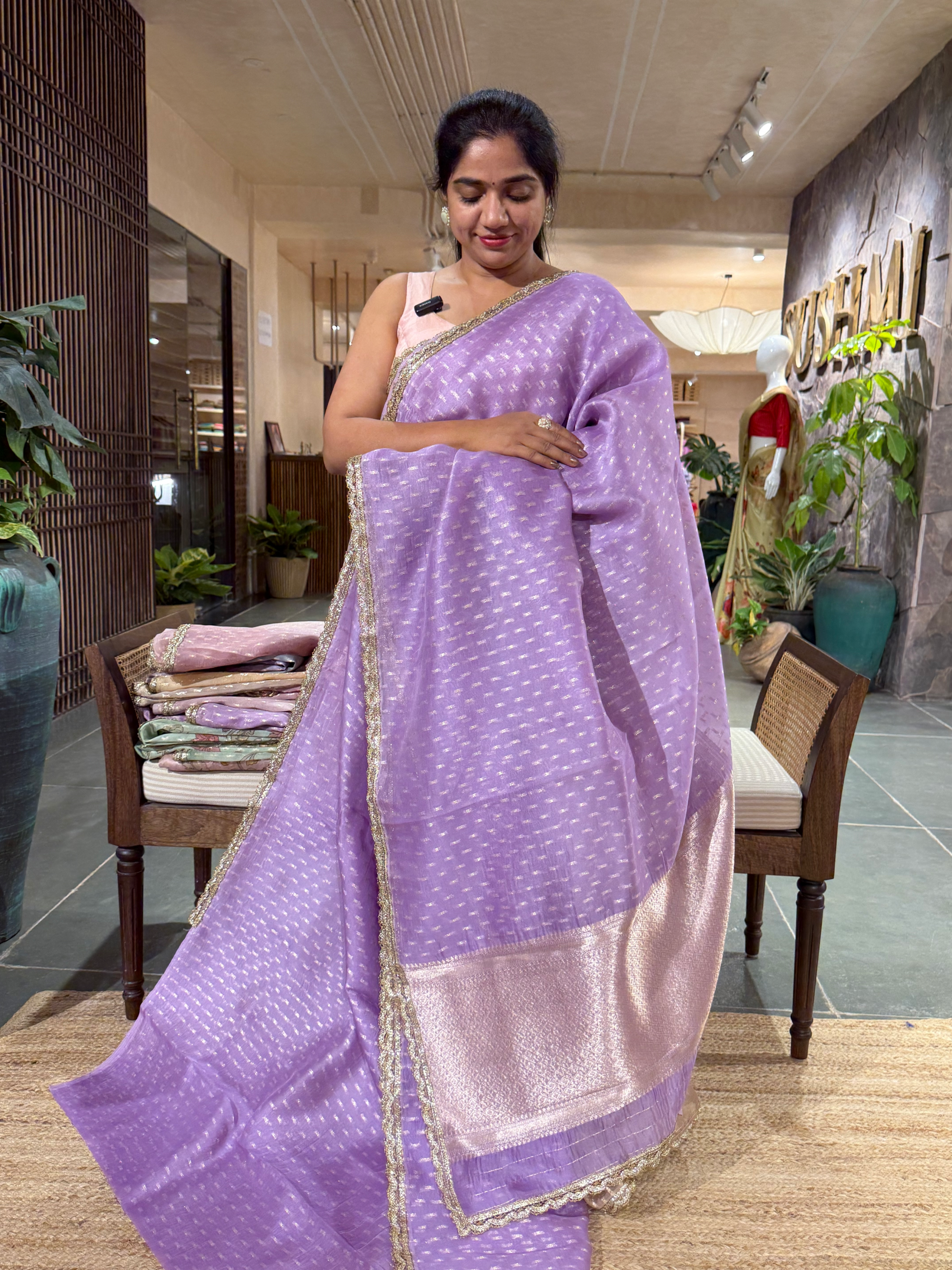 Lilac Pure Organza Saree with allover zari butis paired with Embroidered Blouse