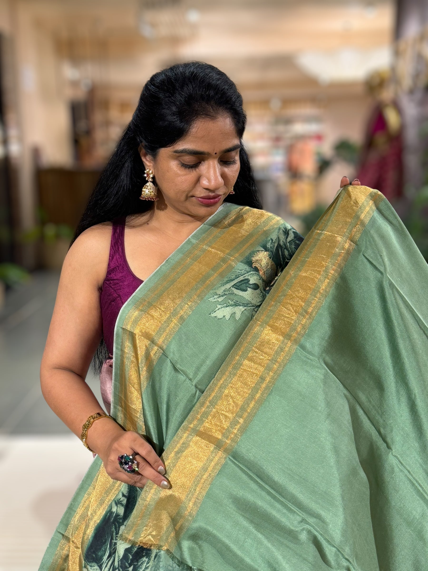 Sage Green Printed Kanchi Soft Silk Saree with Bold Rose Flower Print.