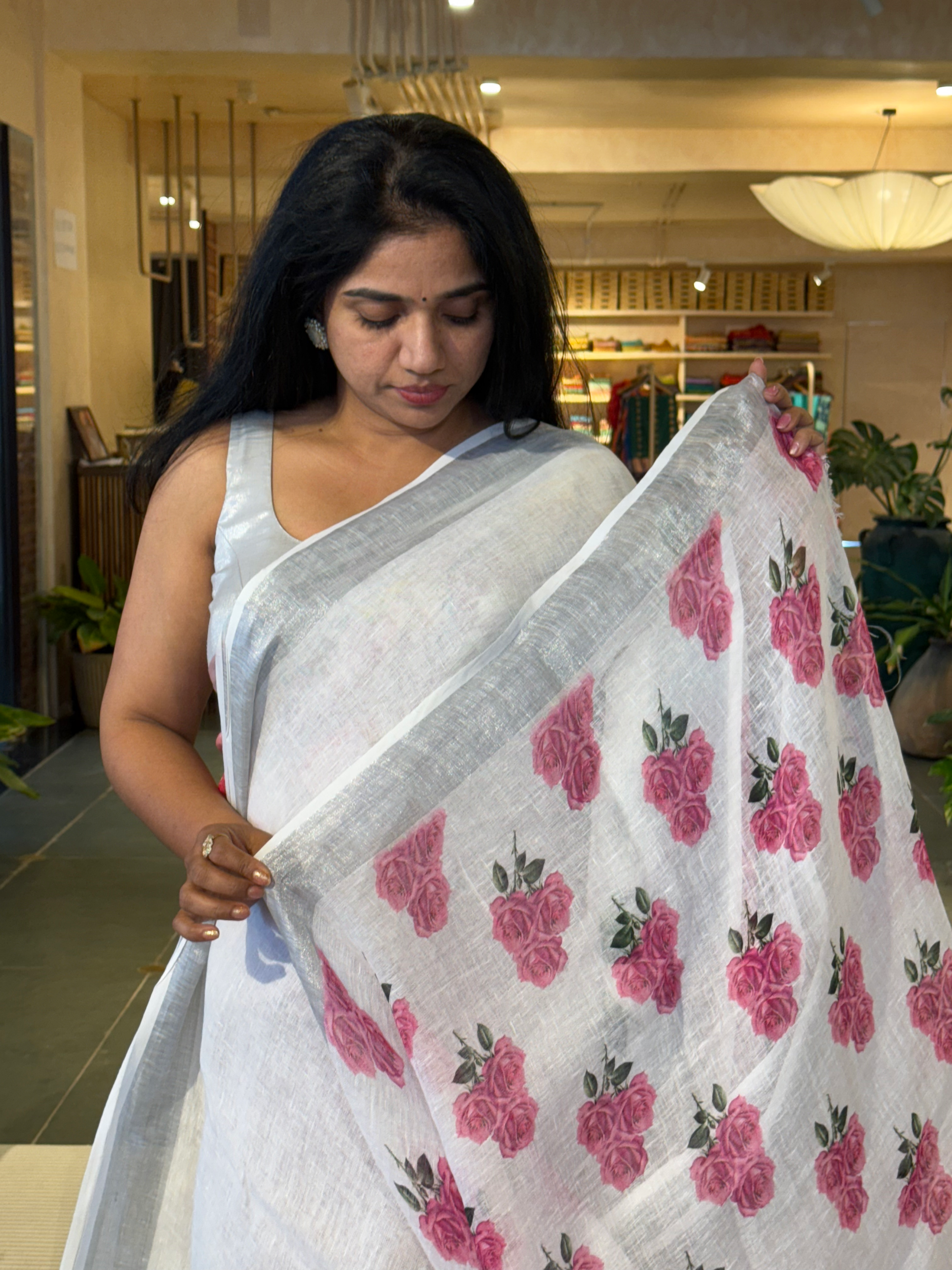 Snow White Pure Handloom Lenin Saree With  Statement Rose Bunch  Print