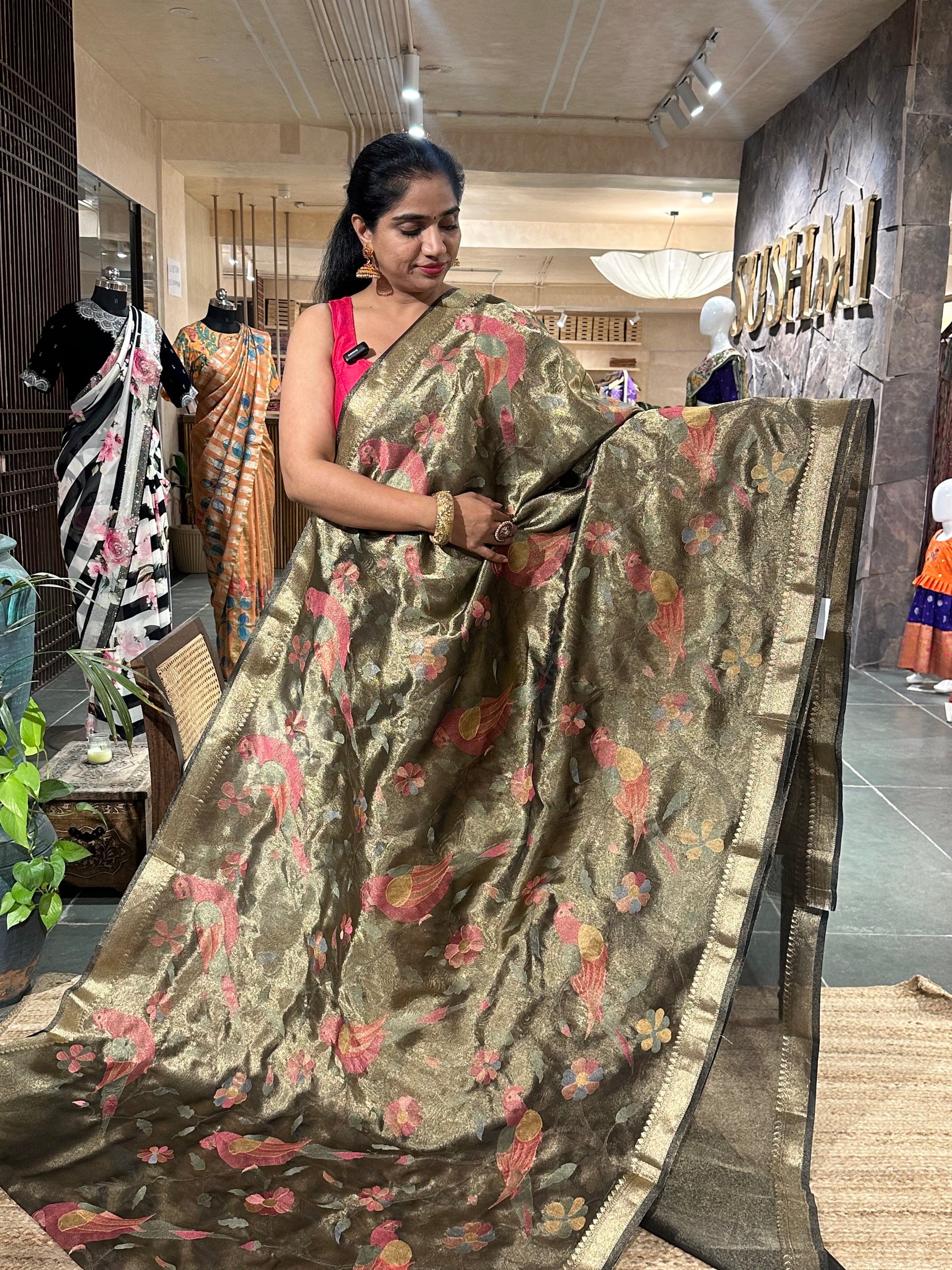Banarasi tissue saree with pythani inspired parrot and floral embroidery