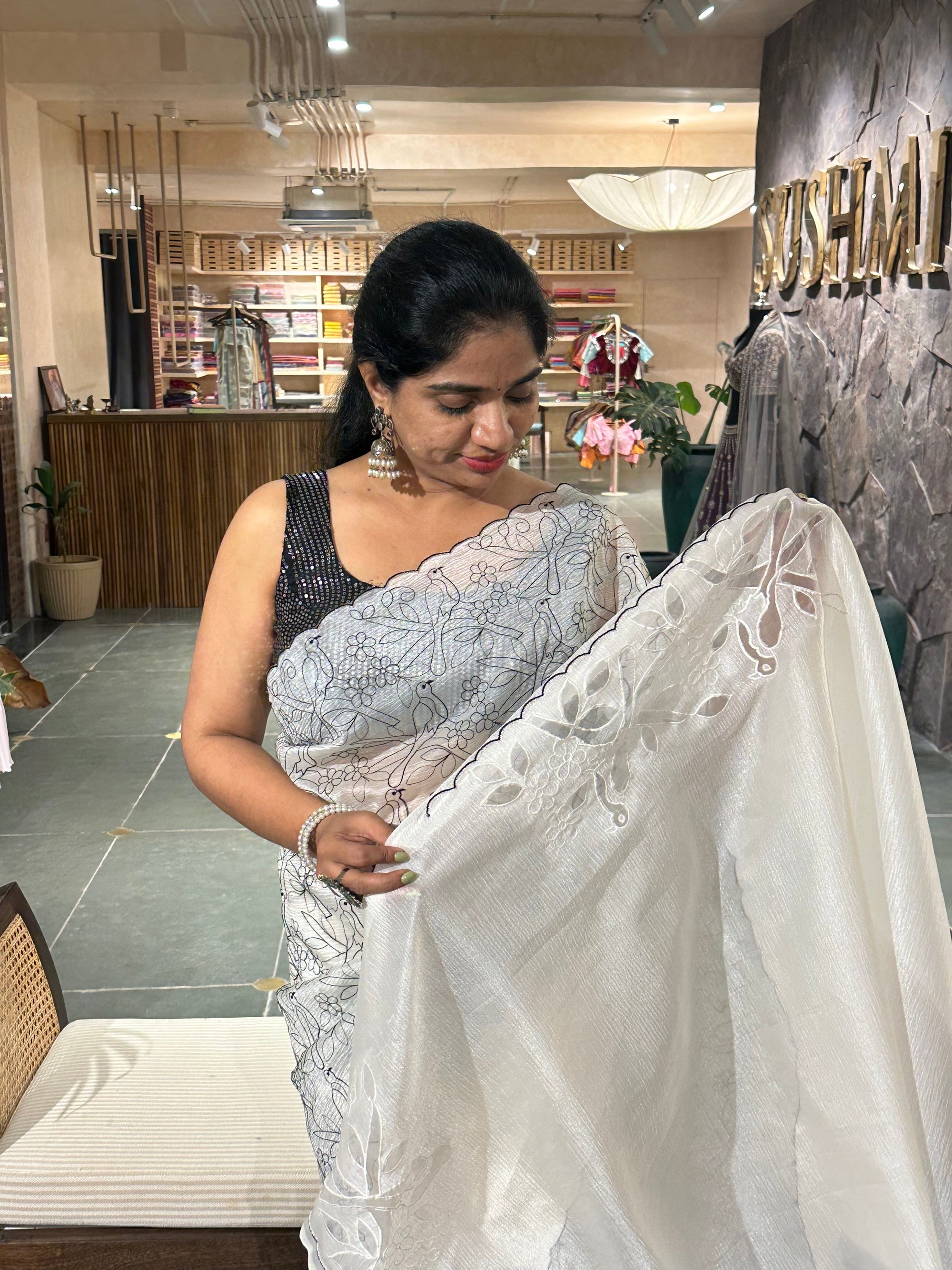 White crush organza saree with allover paithani inspired threadwork and cutwork