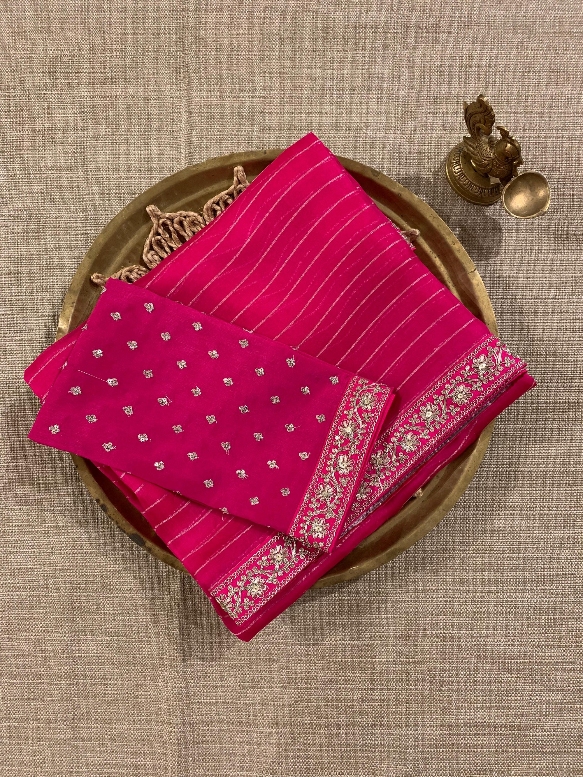 SOSSM2902  Fuschia Pink Organza Silk  Saree hemlined with Sabhyasachi Borders