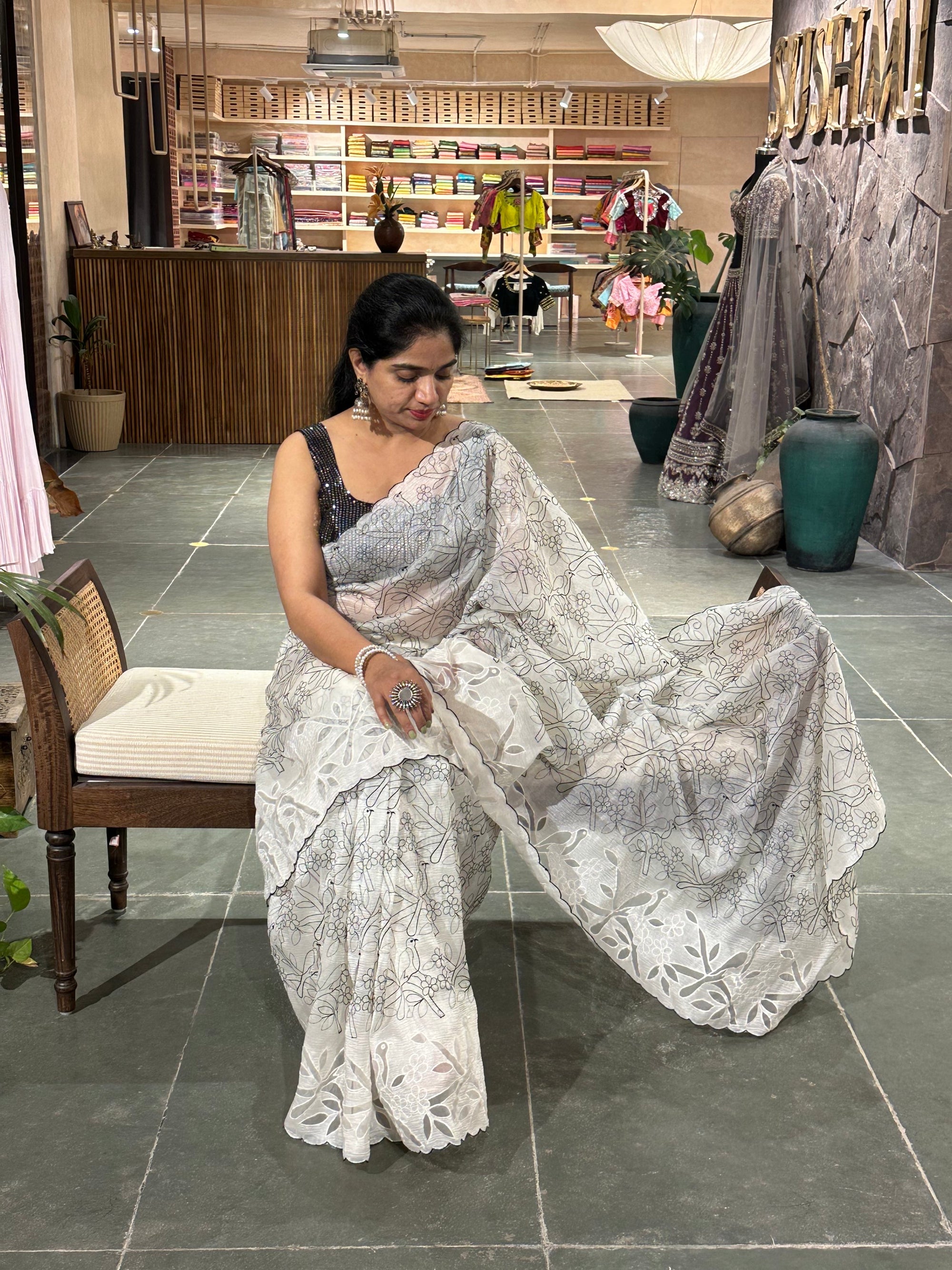 White crush organza saree with allover paithani inspired threadwork and cutwork