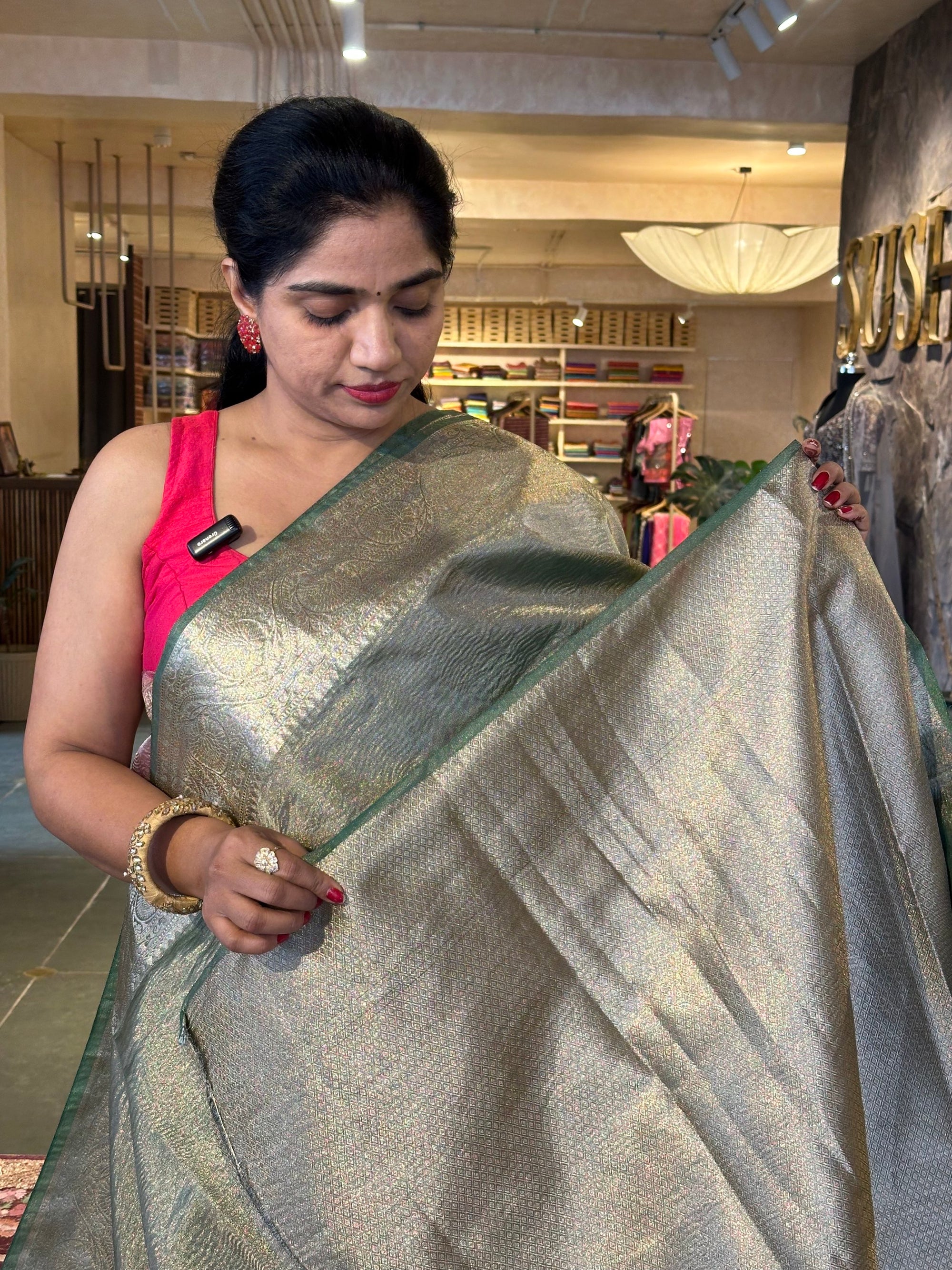 Green Crush Tissue Saree with traditional and embroidered borders